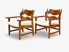 1970s easy chairs by Henning Kjærnulf, Denmark.