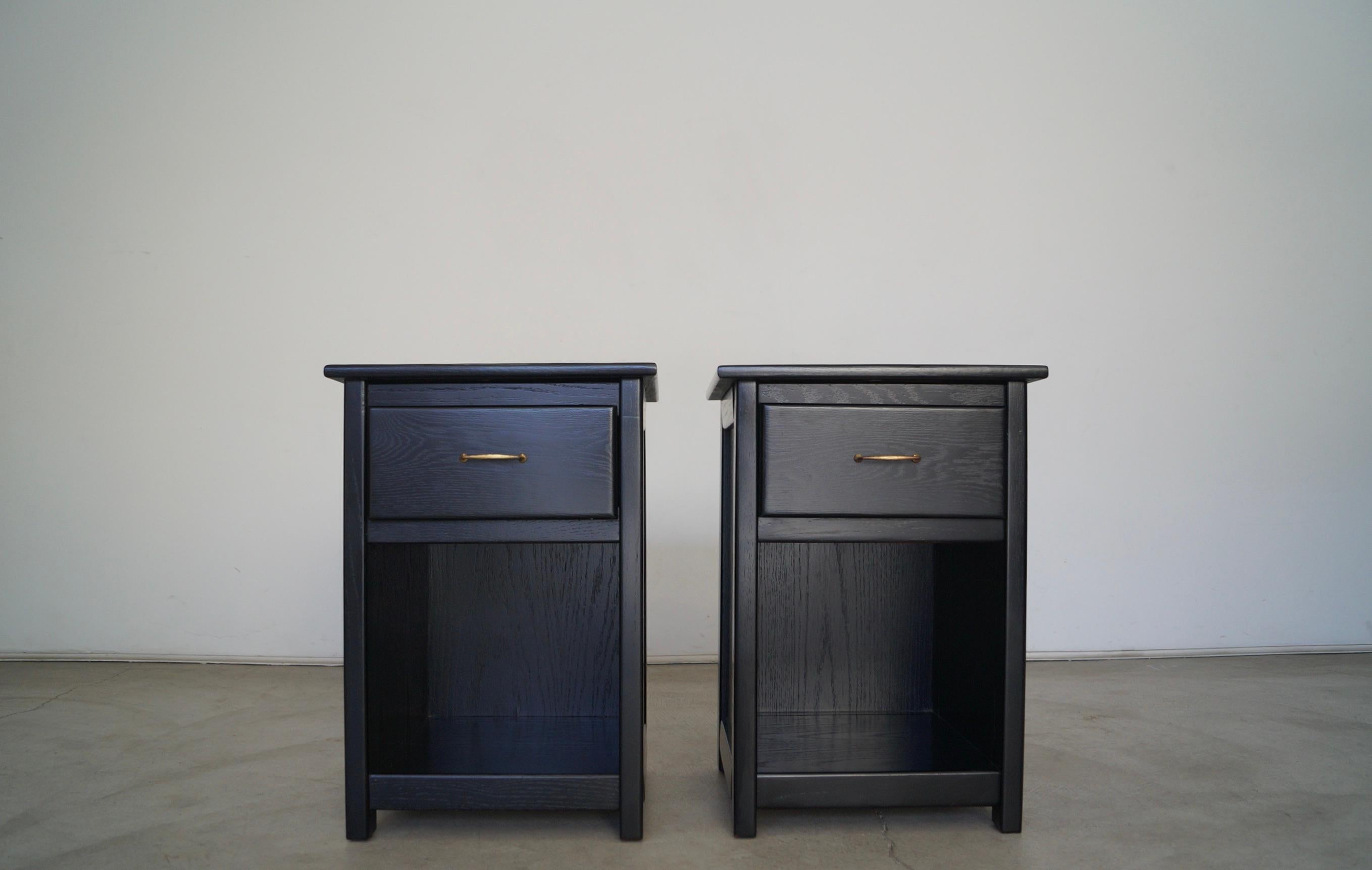 Vintage pair of Craftsman night stands for sale. Made of solid oak with a solid brass handle. They're really solid and well built, and are a great Size. They're from the 1970s, and have been professionally refinished. The oak has been ebonized with