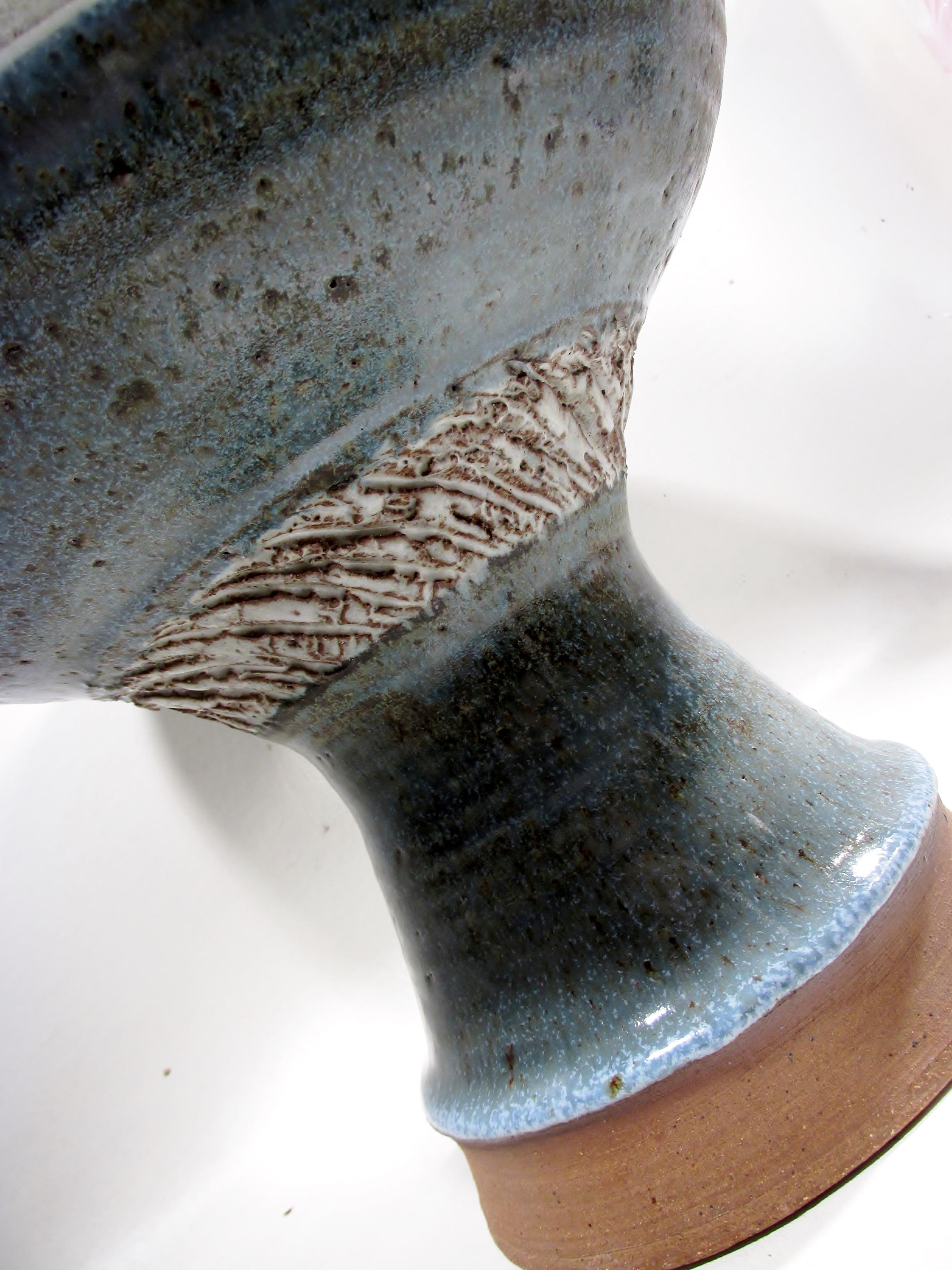 Striking and large scale 10.25” tall and 13.25” dia 1970s era American studio art pottery glazed stoneware chalice. From the studio of the renowned midcentury Colorado potter Edward “Ed” Oshier. Organic form and presence. 

Condition is excellent