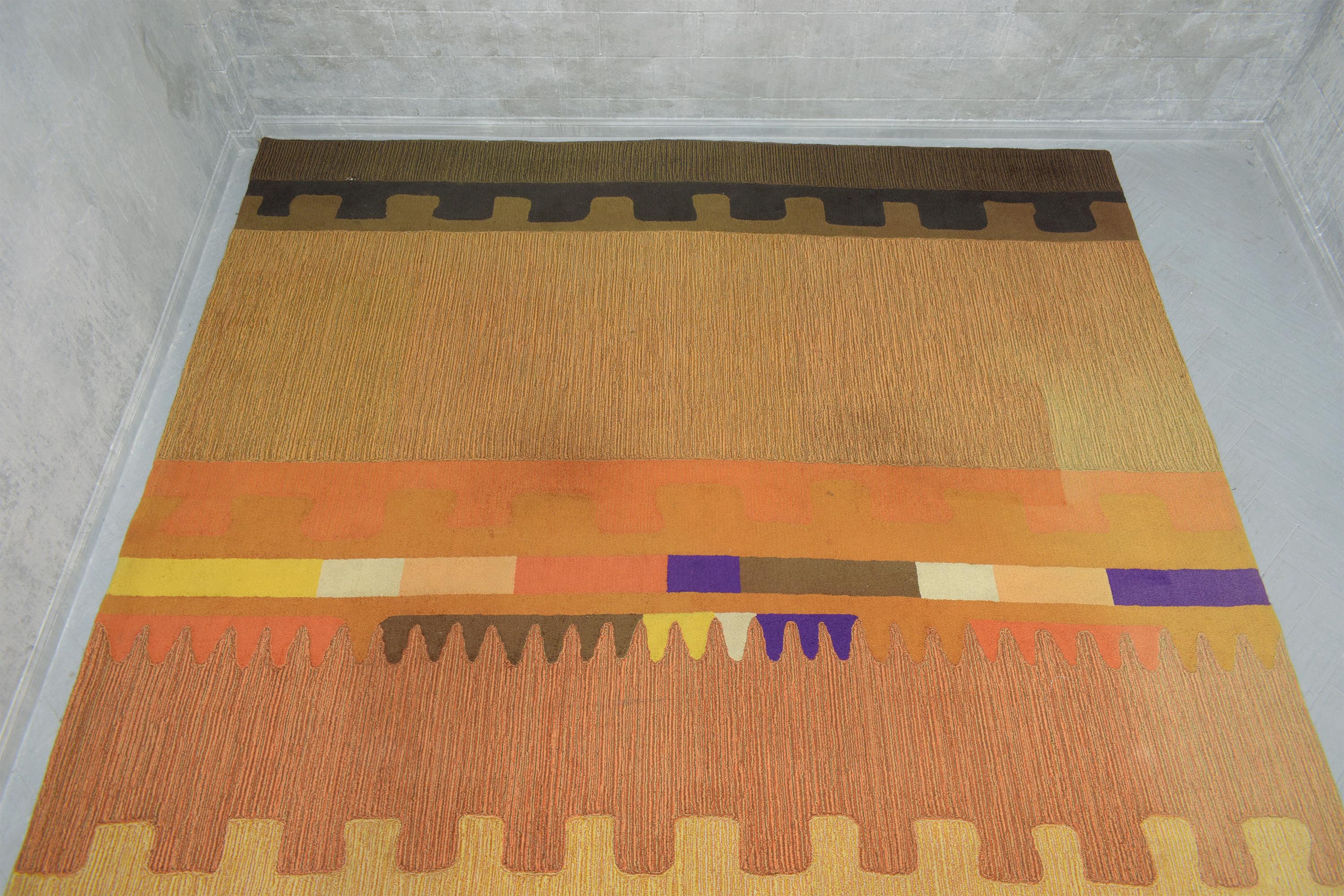 Bring a touch of 1970s flair into your home or office with our striking Modern-style Area Rug, a creation of the legendary designer Edward Fields. This exquisite piece is handcrafted from the finest 100% virgin wool, ensuring both quality and