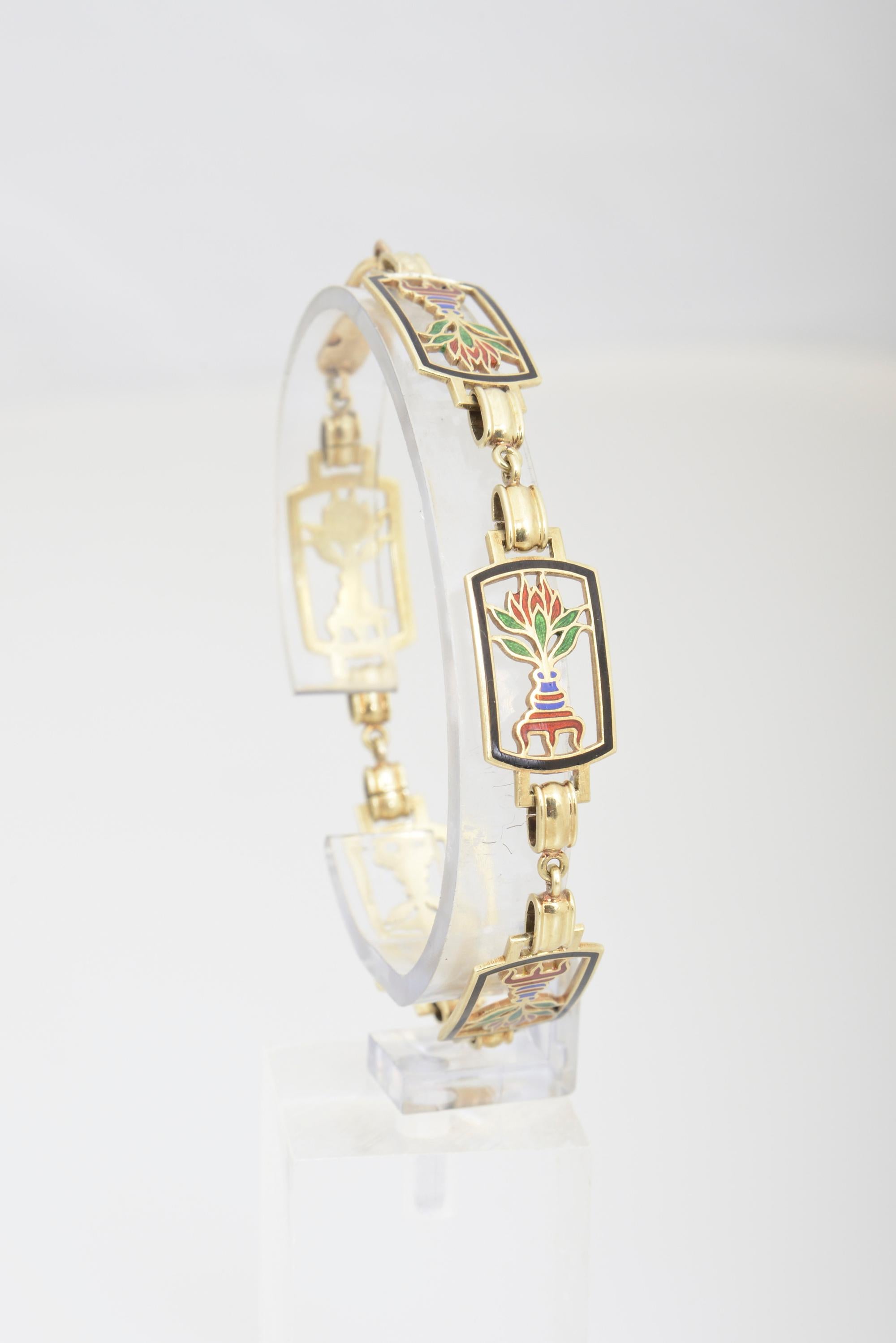 Italian 14K gold bracelet containing five cloisonné polychrome enamel plaques with lotus coming out of a vase design. Stamped 14k Faro Italy