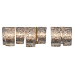 Lampadario a otto bracci in ottone degli anni '70 con vasi in vetro artistico trasparente di Markaryd, Svezia