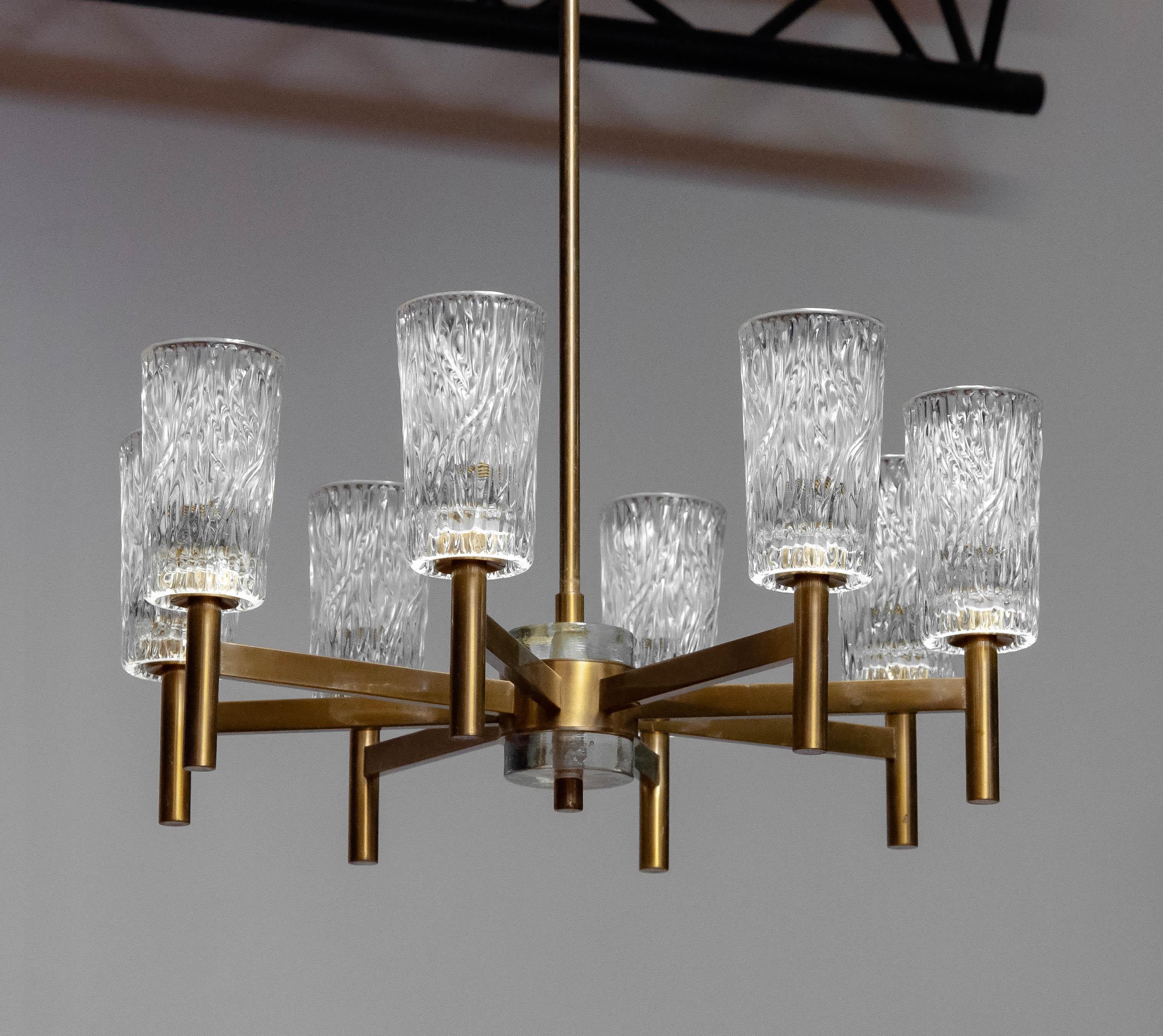 Ottone 1970s Eight-Arm Brass Chandelier with Clear Art Glass Vases by Markaryd, Sweden in vendita