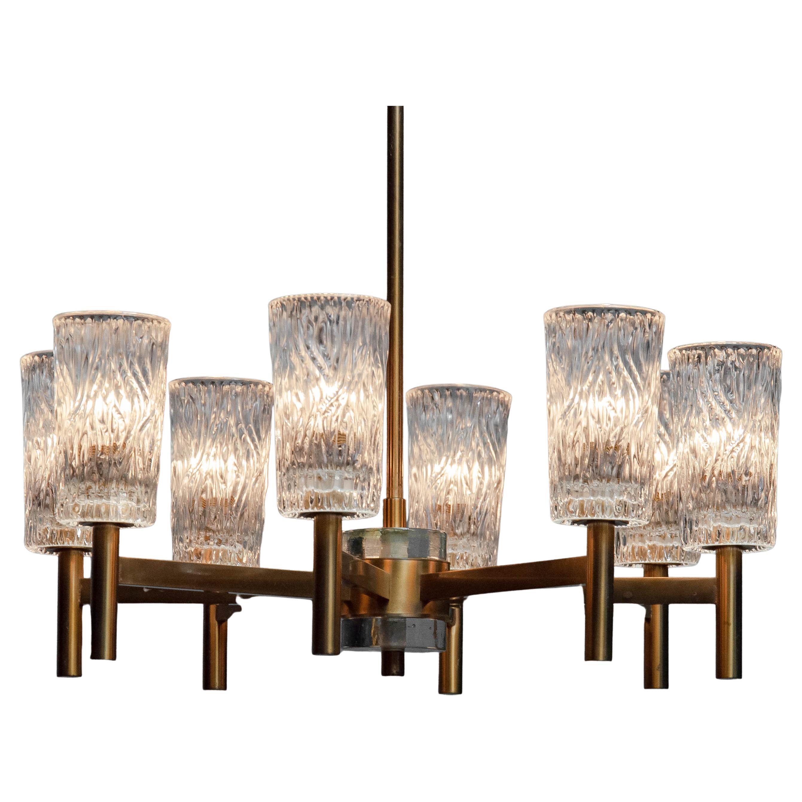 1970s Eight-Arm Brass Chandelier with Clear Art Glass Vases by Markaryd, Sweden in vendita