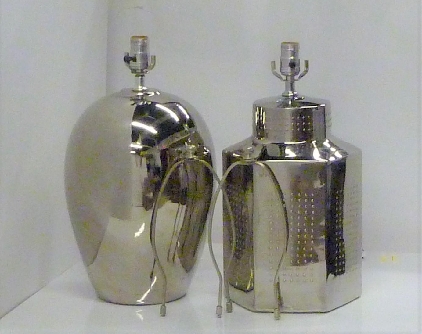 1970s shiny elegance in this pair of complimentary styled mirror glazed pottery lamps from Tyndale. Beautiful original condition, included their harps and finials. One an oval egg shape, the other a tea jar shape with nubs. Two of the pics show