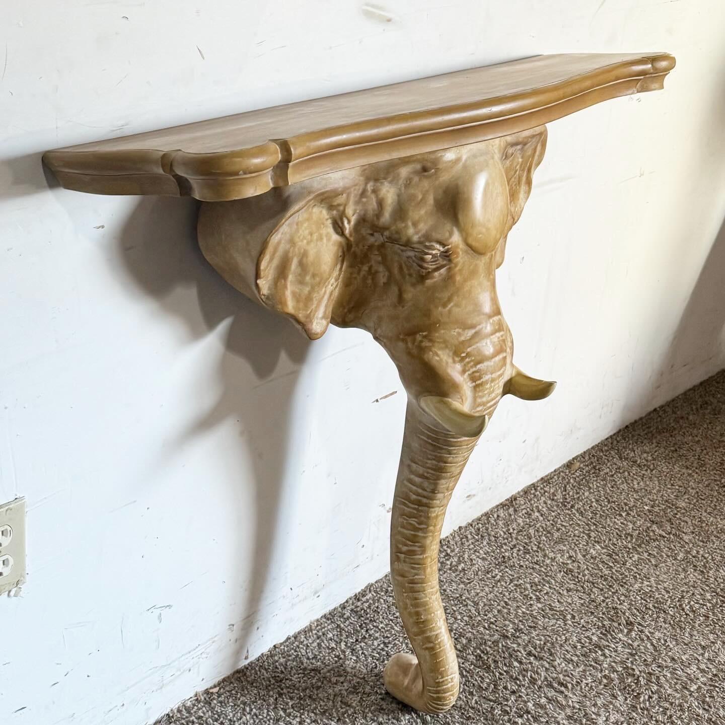 Discover the 1970s Chapman Elephant Console Table, a blend of coastal elegance and Palm Beach luxury.