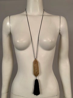 1970's Elsa Peretti for Halston Tiffany & Co 18k Gold Bag & Silk Tassel Necklace