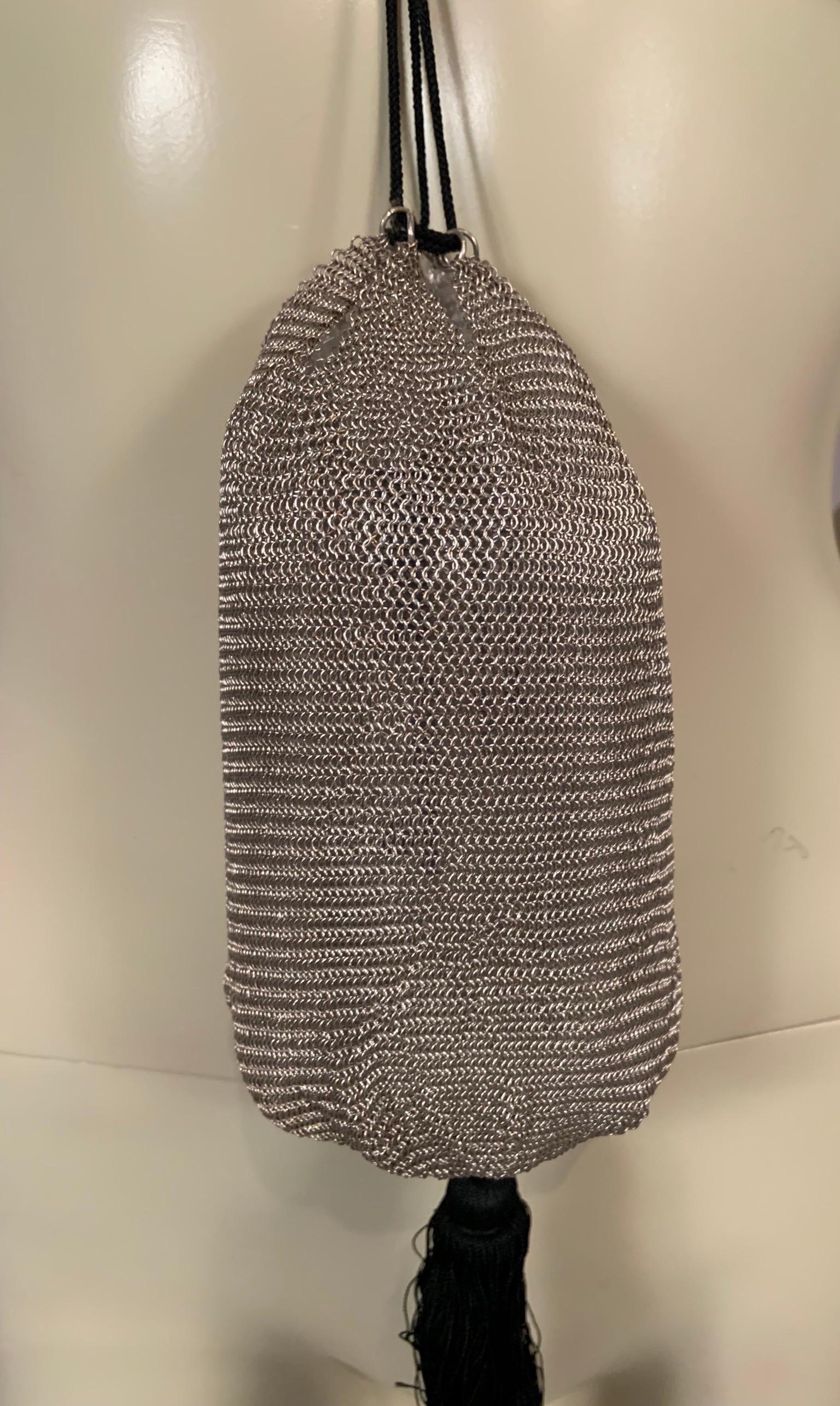 Designed by Elsa Peretti for Halston in the mid 1970's and retailed by Tiffany & Co. this sterling silver mesh bag is a rare find from the mesh collection.  I have only owned two of these and the first one is included in a museum collection of early