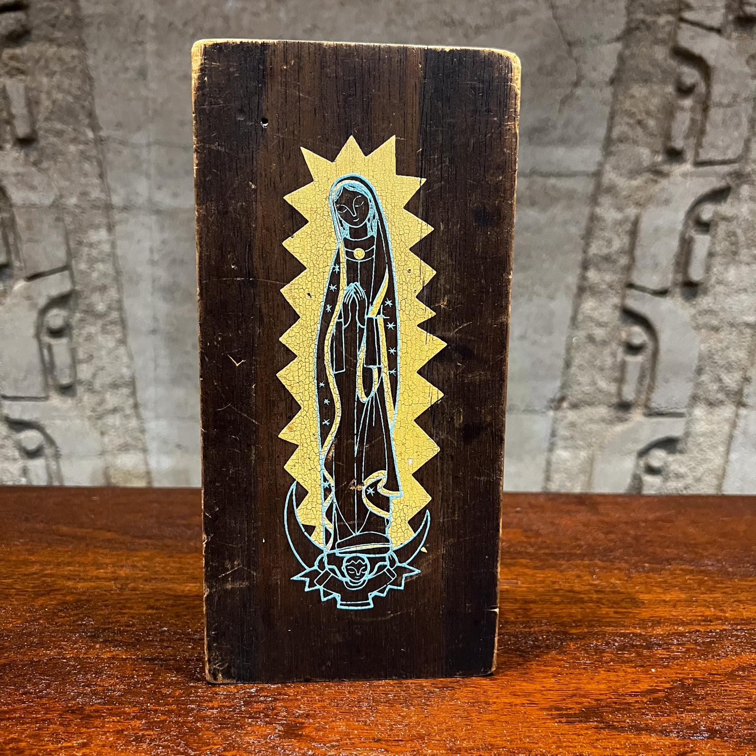 1970s by Emaus Monks Abstract Virgin Mary Art Cuernavaca, Mexico
Painted Wall Art Panel Mahogany Wood
Maker stamp on backside
10 tall x 5 w x .75 thick
Original vintage unrestored condition. Wear is visible.
Please expect vintage condition, refer to