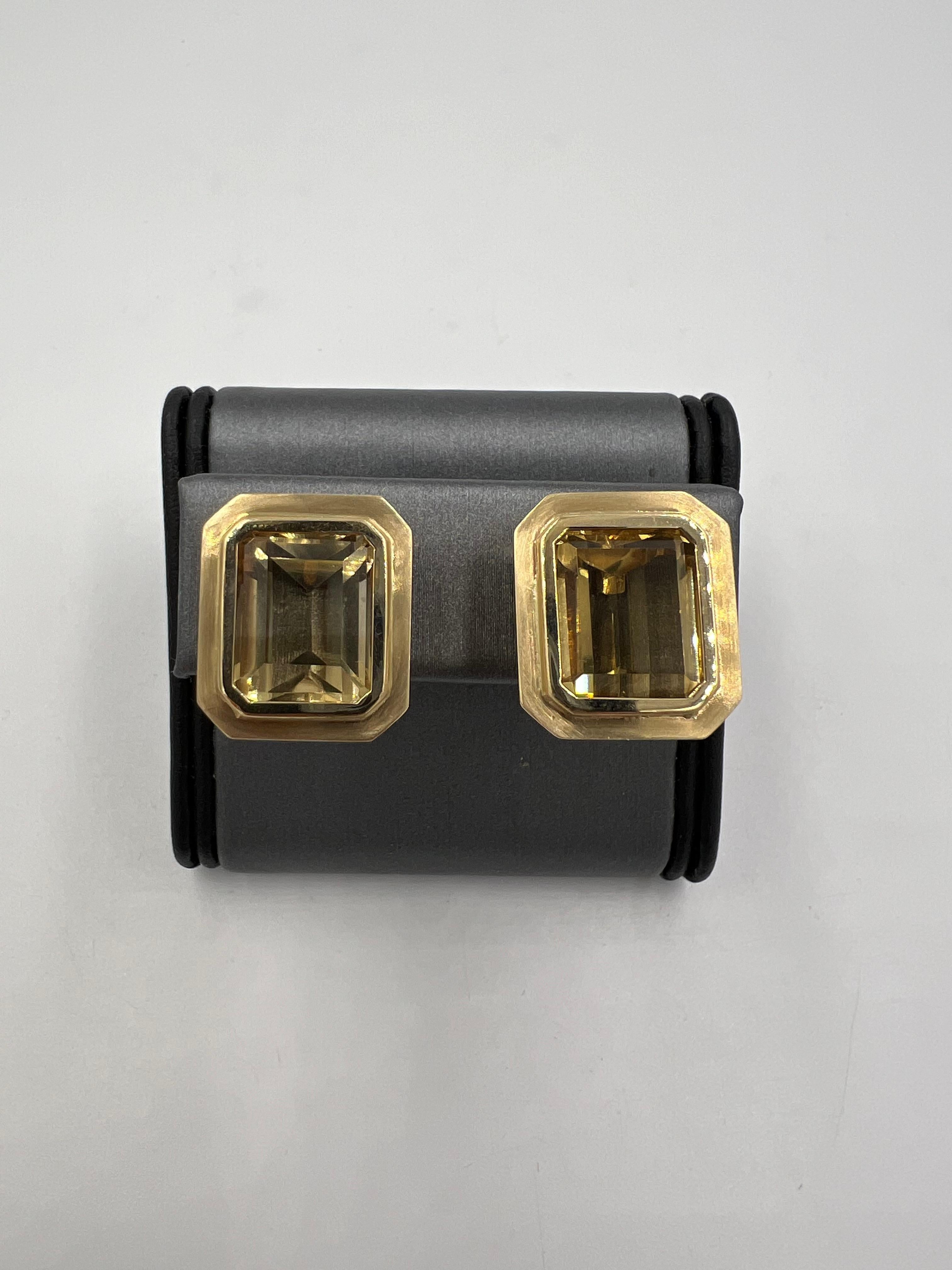 1970s emerald cut Citrine 14k yellow gold clip and post earrings.

Back in the 1970s, these emerald cut Citrine 14k yellow gold clip and post earrings were custom-made.  The attention to detail in the design and construction of these earrings are