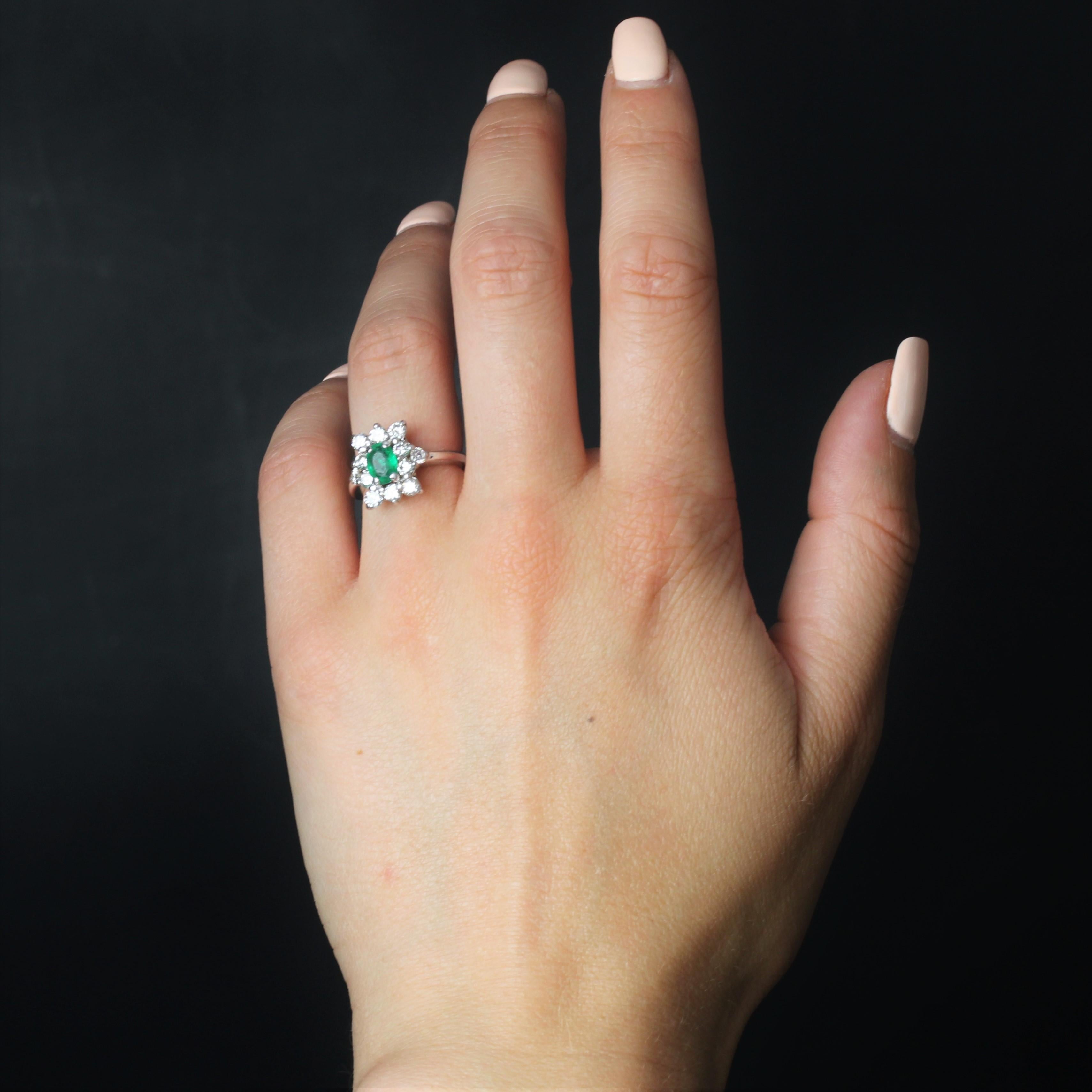 Oval Cut 1970s Emerald Diamonds 18 Karat White Gold Daisy Ring For Sale