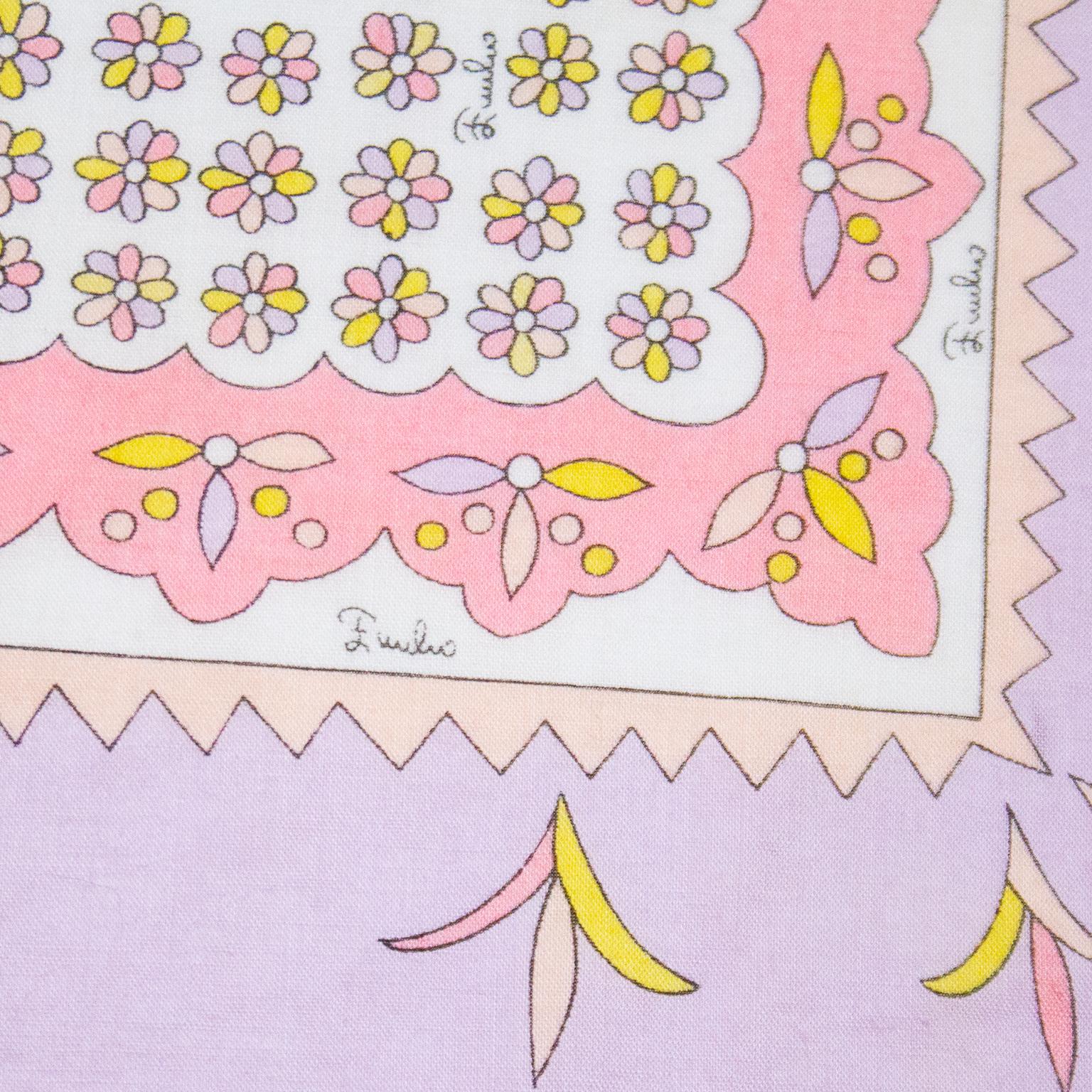 Darling Emilio Pucci cotton flower print scarf from the 1970s. Such a stunning pastel color combination of lavender, pinks, yellow and white. Square shape. Brand signature throughout fabric. Perfect summer scarf, tie around the neck, around your