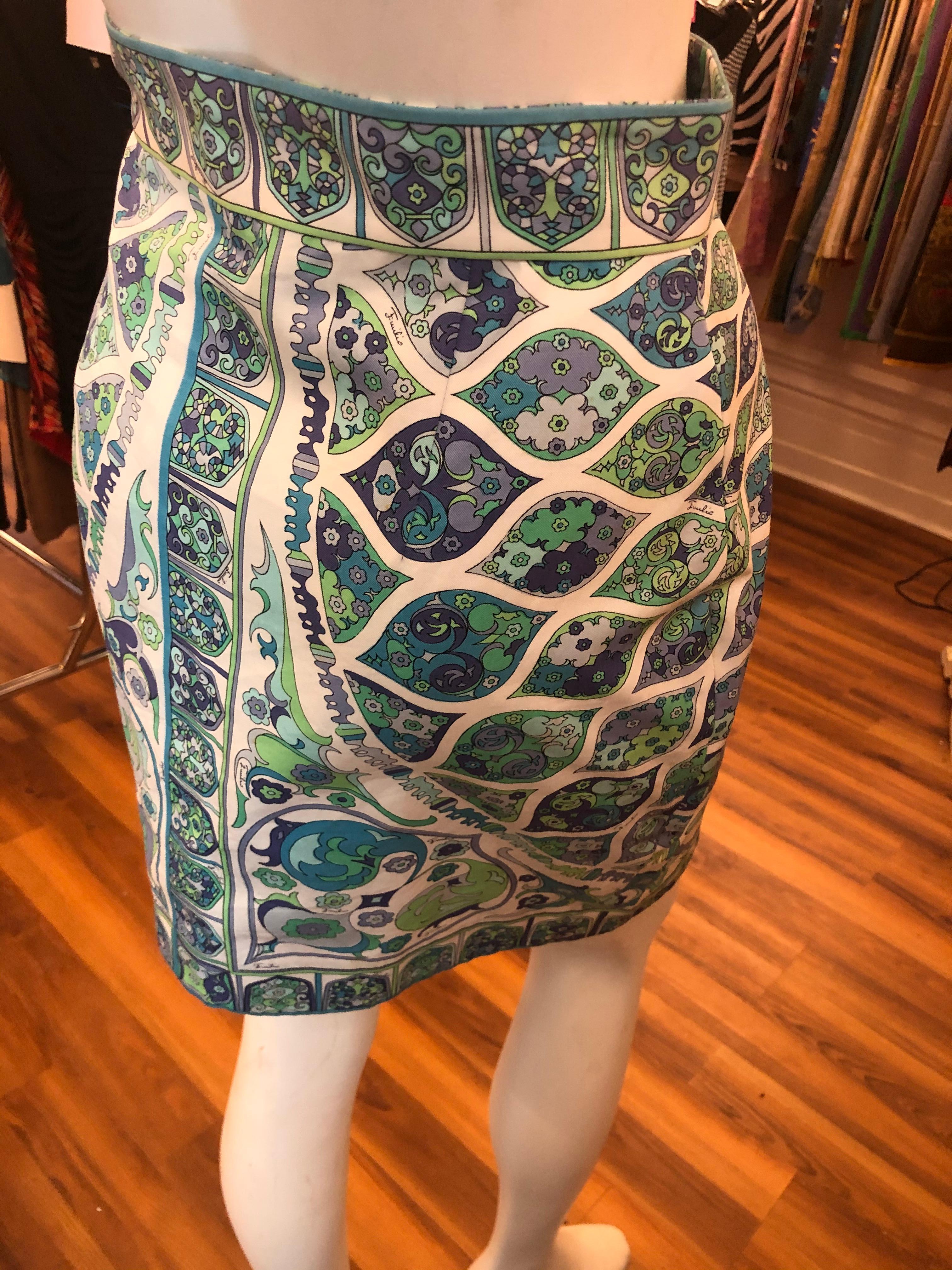 This is a lovely high waisted skirt with the Emilio signature throughout. The dominant colors are white, green, lilac and blue weaved into a geometric pattern.

There are a few small faint spots on this skirt and the price quoted reflects that.