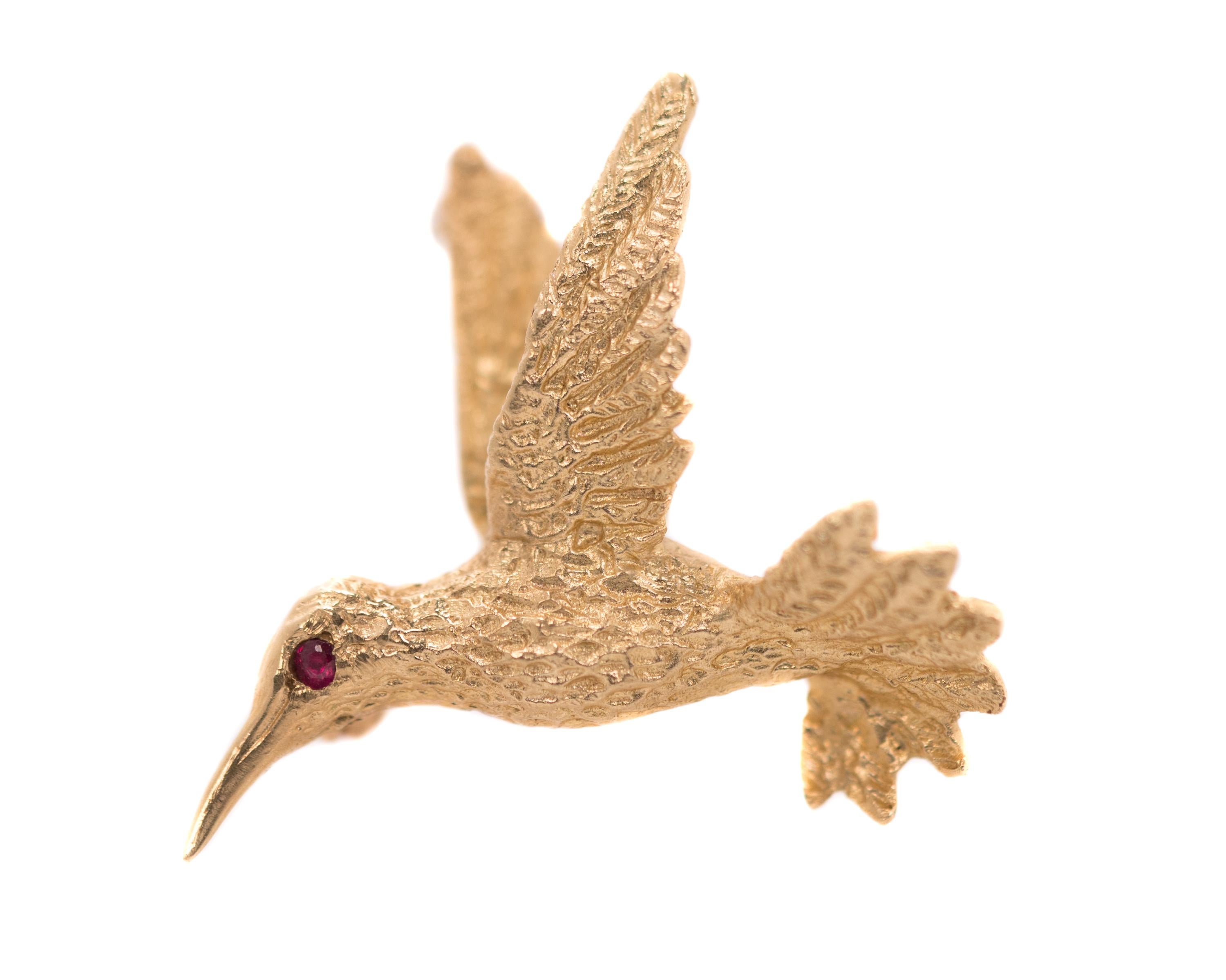 Engel Brothers Hummingbird Pin - 14 Karat Yellow Gold, Ruby

Features:
Rich, textured 14 Karat Yellow Gold
Ruby Eye
Safety Clasp
Hallmarked EB inside a Diamond shape on back of brooch
Dimensions: 27 x 24 millimeters
Depth: 11 millimeters

Brooch