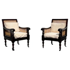 Poltrone in mogano con canne della biblioteca inglese Bergère degli anni '70