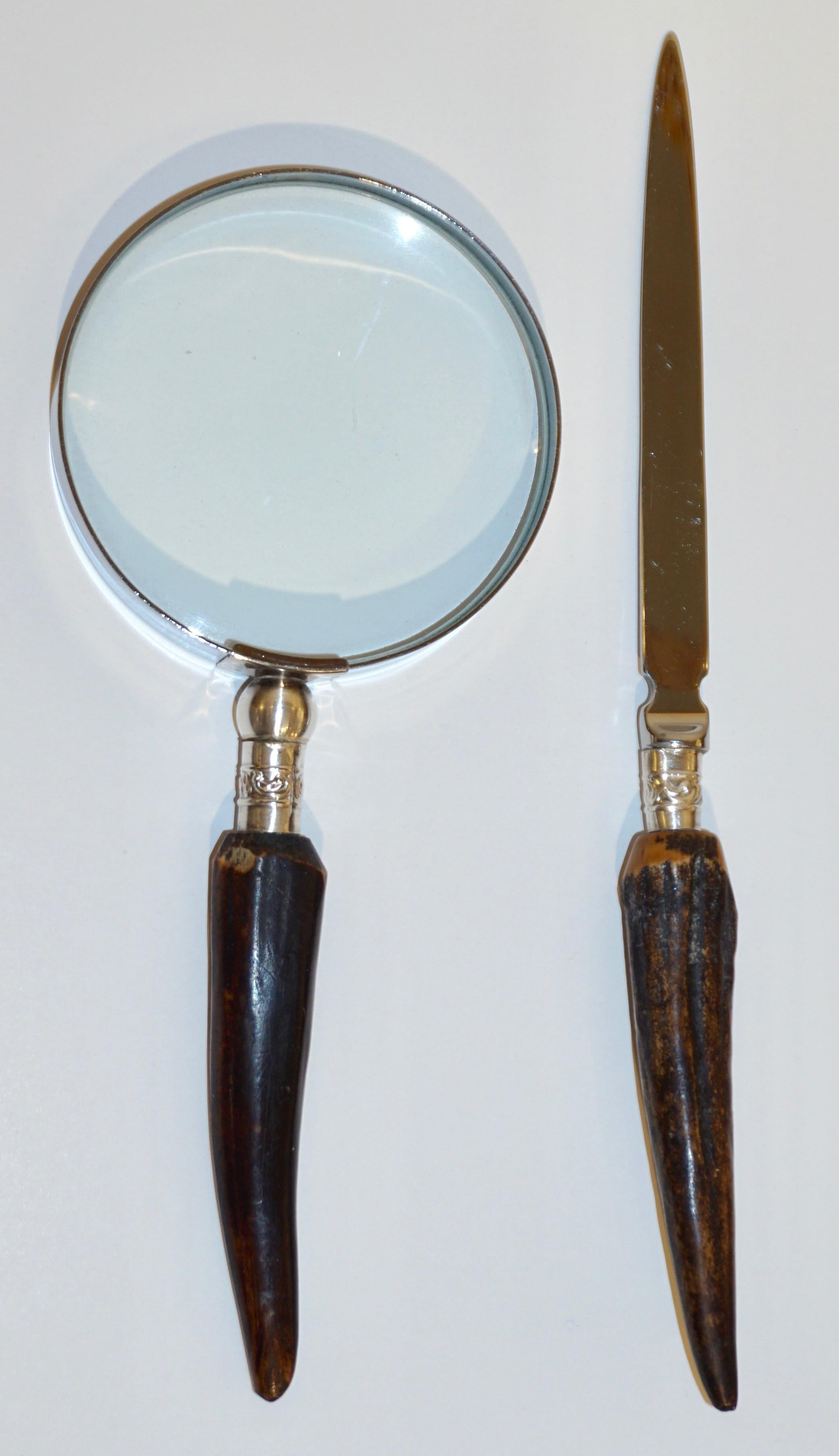 A vintage Mid-Century Modern set composed of a magnifying glass and a letter opener with antler handles mounted with a hand-crafted sterling silver decor supporting the stainless steel glass rim and blade.
Can be purchased individually:
magnifier