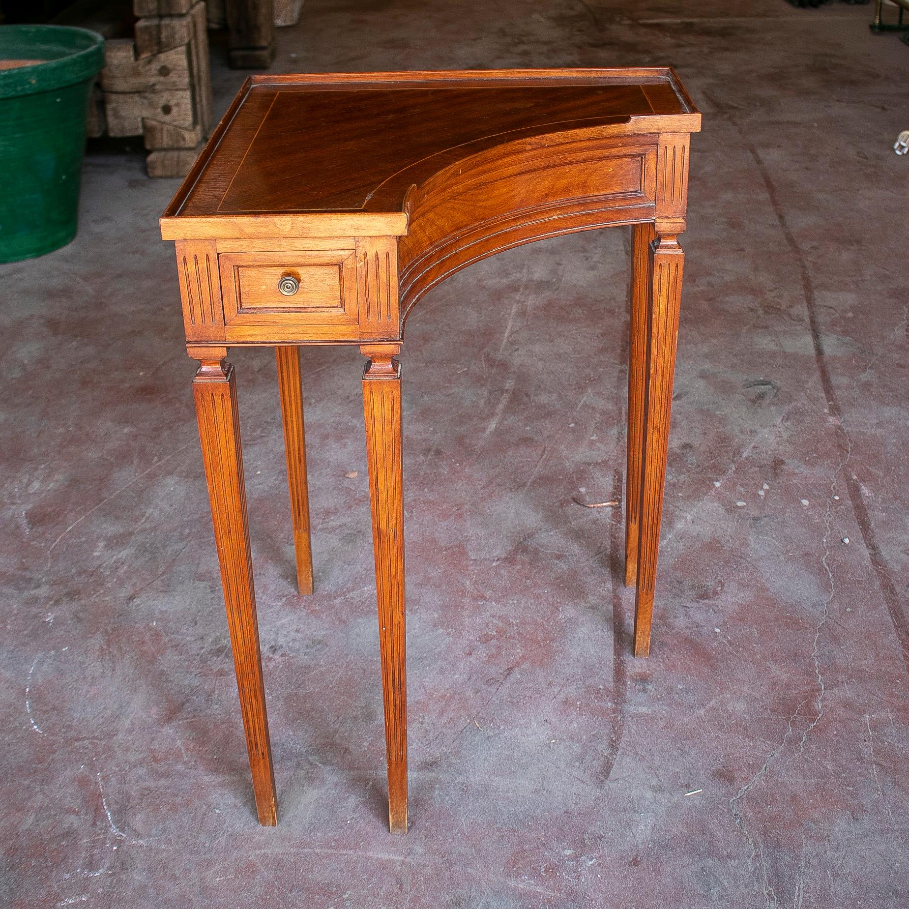 Vintage 1970s English mahogany corner table.