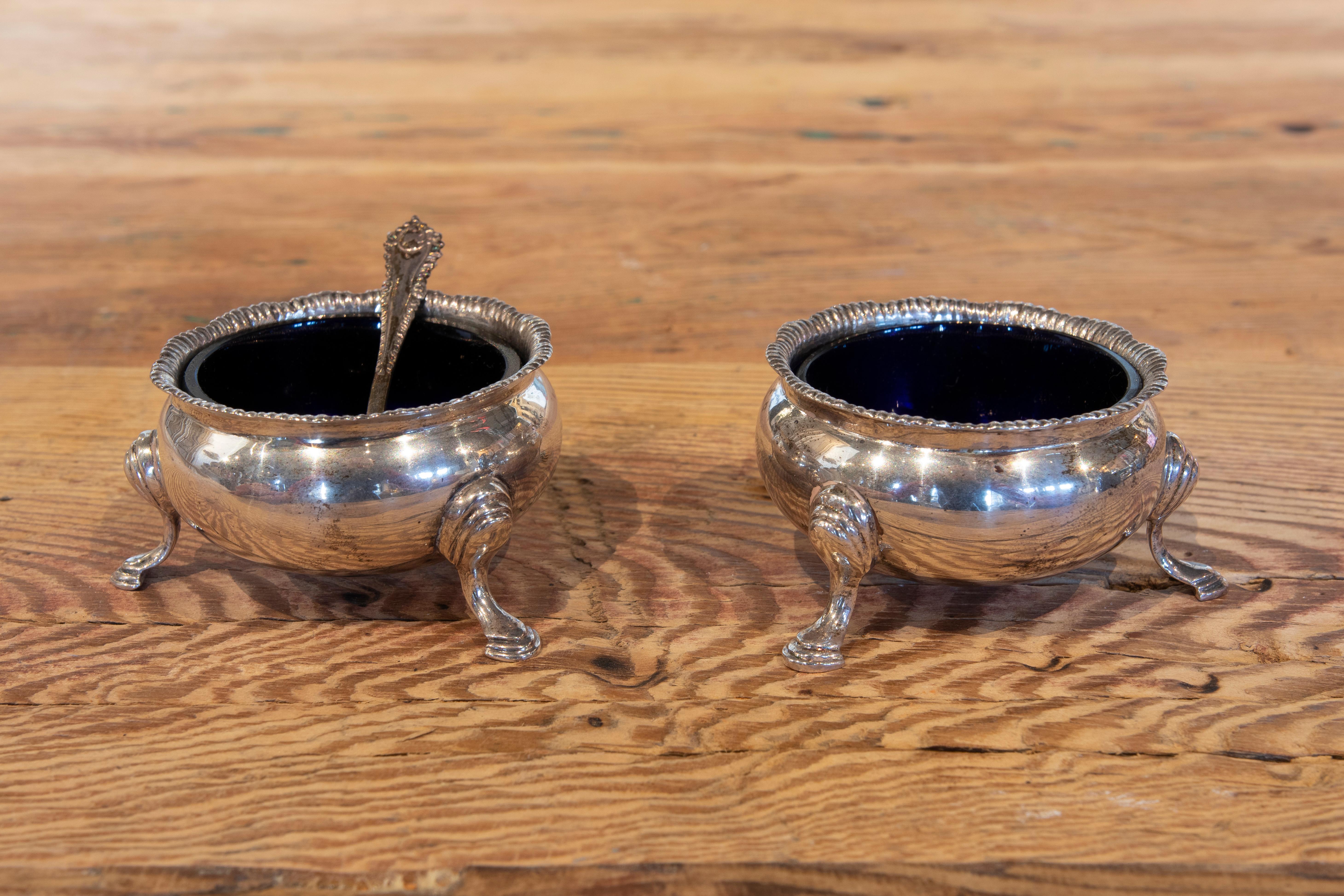 1970s English pair of silver and crystal salt cellars with Harrods Hallmarking
The spoon measures 7cm.