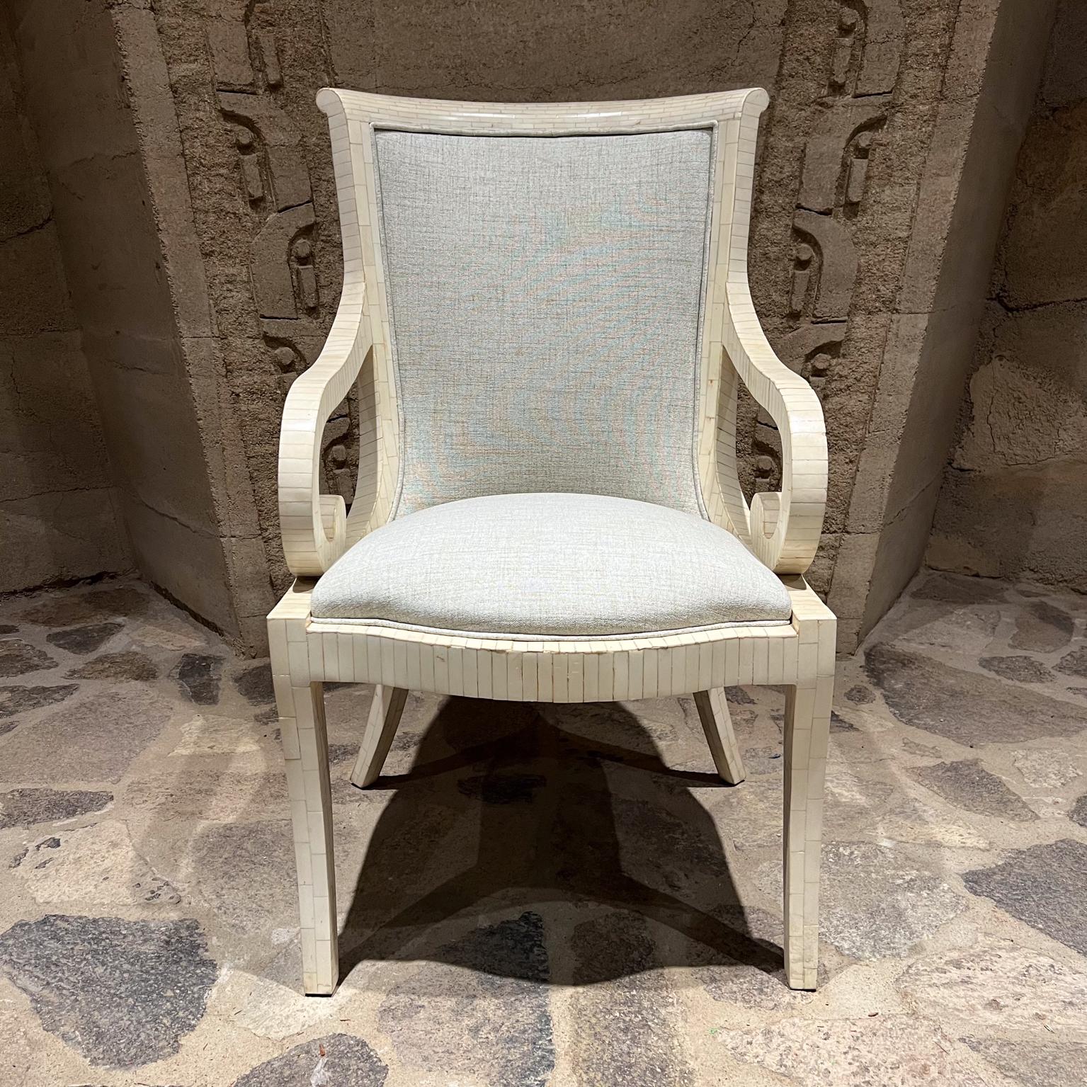 1970s Enrique Garcel (in the style of Karl Springer + Maitland Smith)
Armchair in tessellated bone
Fabulous sculptural profile
Original vintage preowned condition with new upholstery.
Some tiles have been restored.
39 h x 22.5 w x 28.25 d
Arm rest