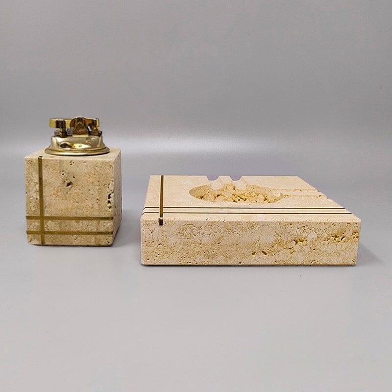1970s Gorgeous smoking set by Enzo Mari for F.lli Mannelli in travertine and brass with ashtray and table lighter, everything is handmade carved. Made in Italy. The table lighter works. This smoking set is in excellent condition.
Dimension :
Table