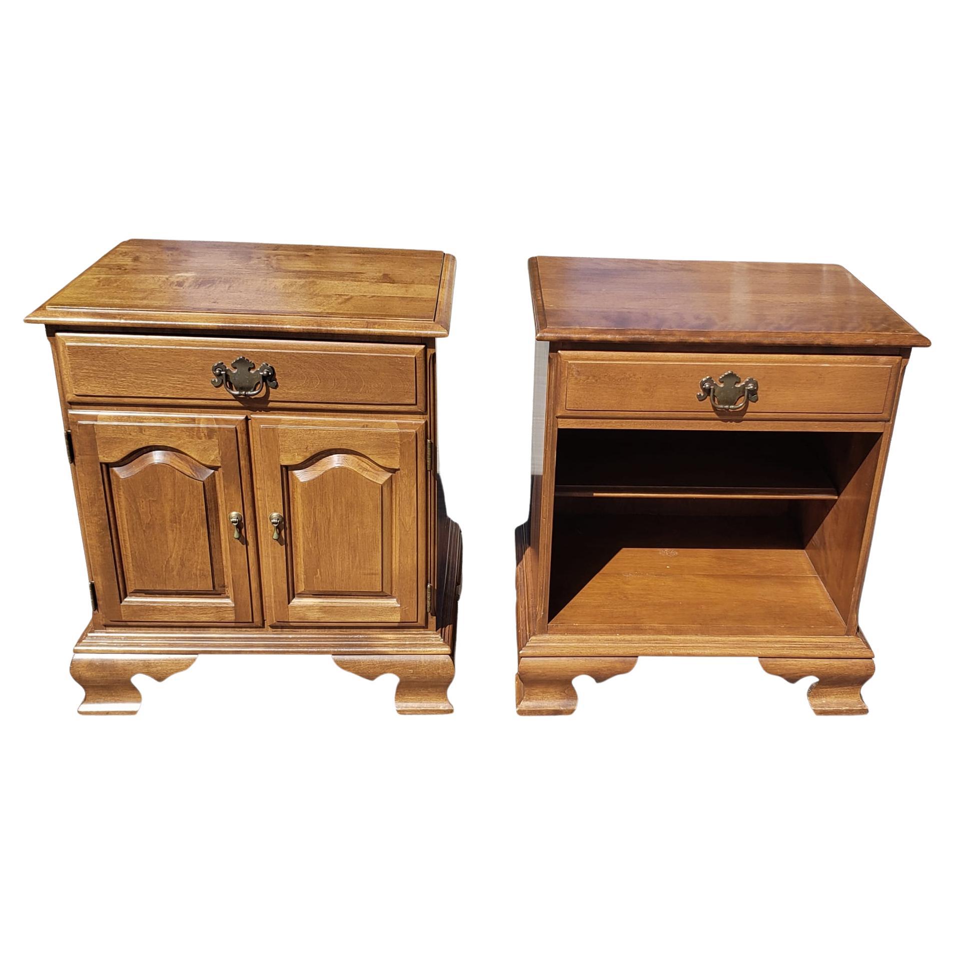 A pair of 1970s Ethan Allen Heirloom Maple Bedside Tables Nightstands in good vintage condition. Feature one drawer with dovetail joints, one adjustable height shelf. Measures 22