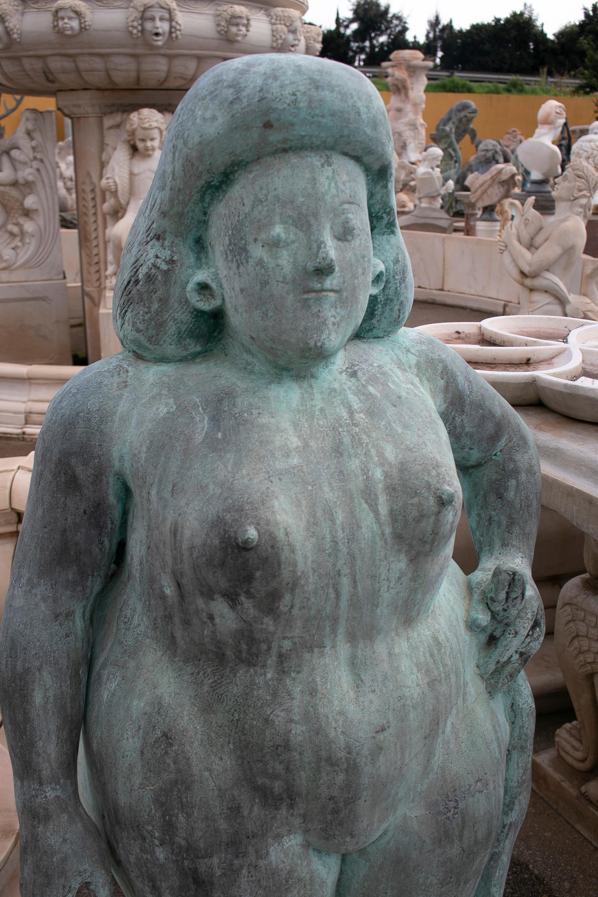 1970s European woman bronze sculpture reminiscent of Botero's large sumptuous style.
