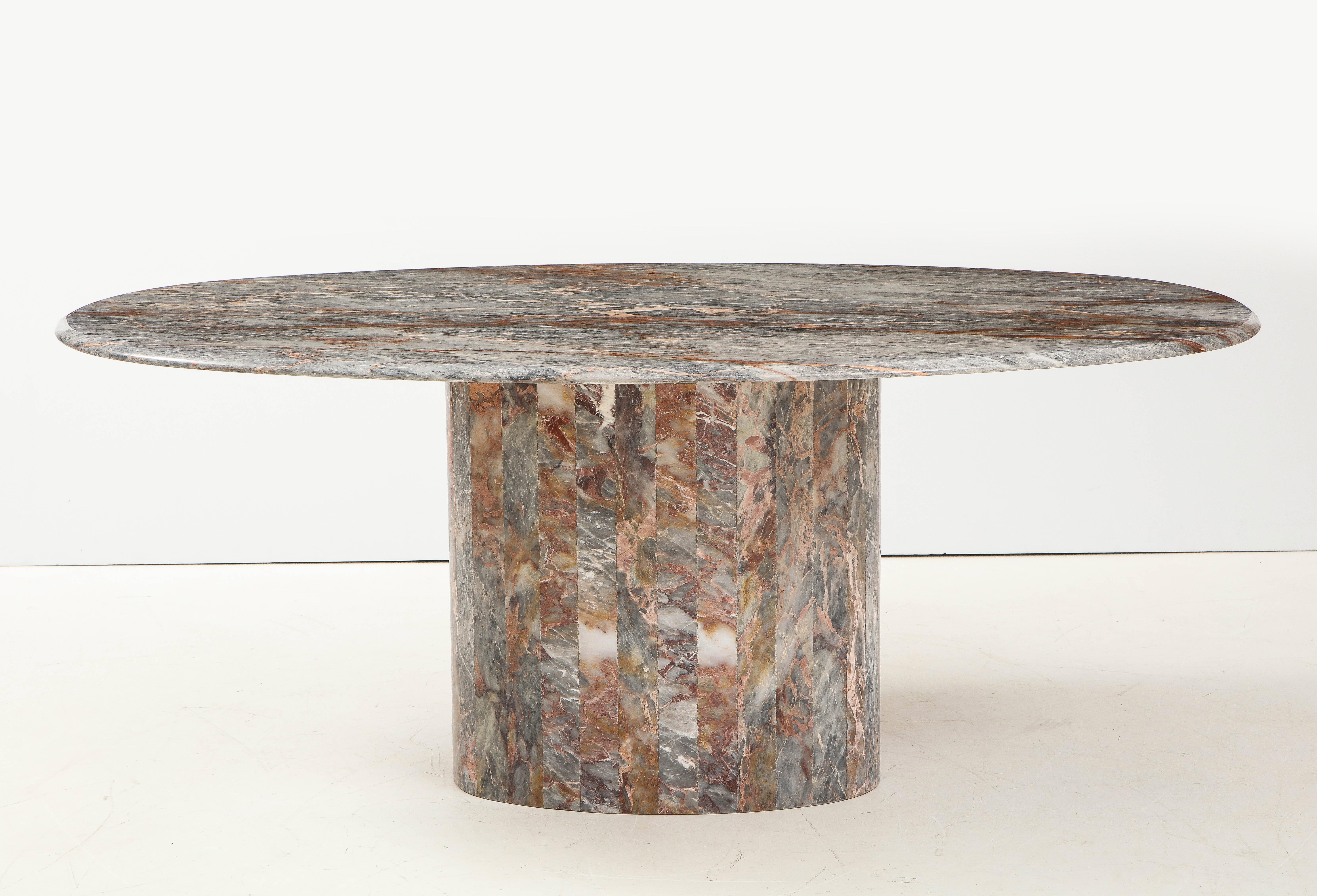 Stunning 1970's Mid-Century Modern exotic marble Italian oval dining table, In vintage original condition, with minor wear and patina due to age and use.