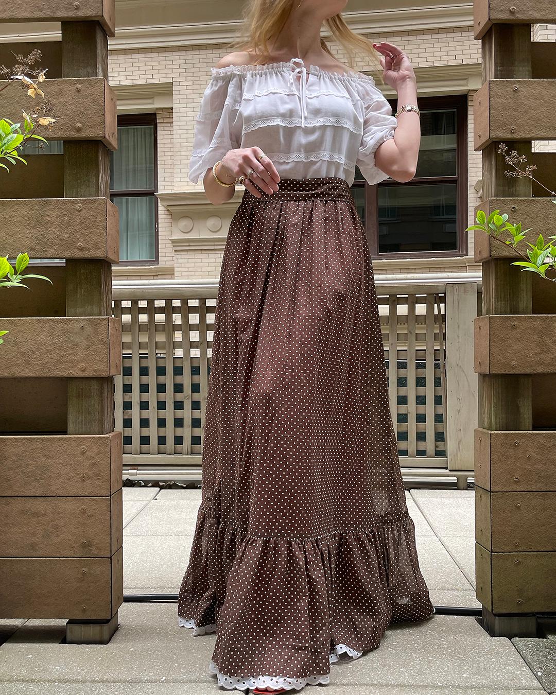 1970s Eyelet Off-The-Shoulder Maxidress with Polka Dot Skirt: I love an off-the-shoulder dress, and this one certainly delivers. It reminds me of the Rive Gauche dresses Yves Saint Laurent was doing in the 1970s— an easy, bohemian glamour! The