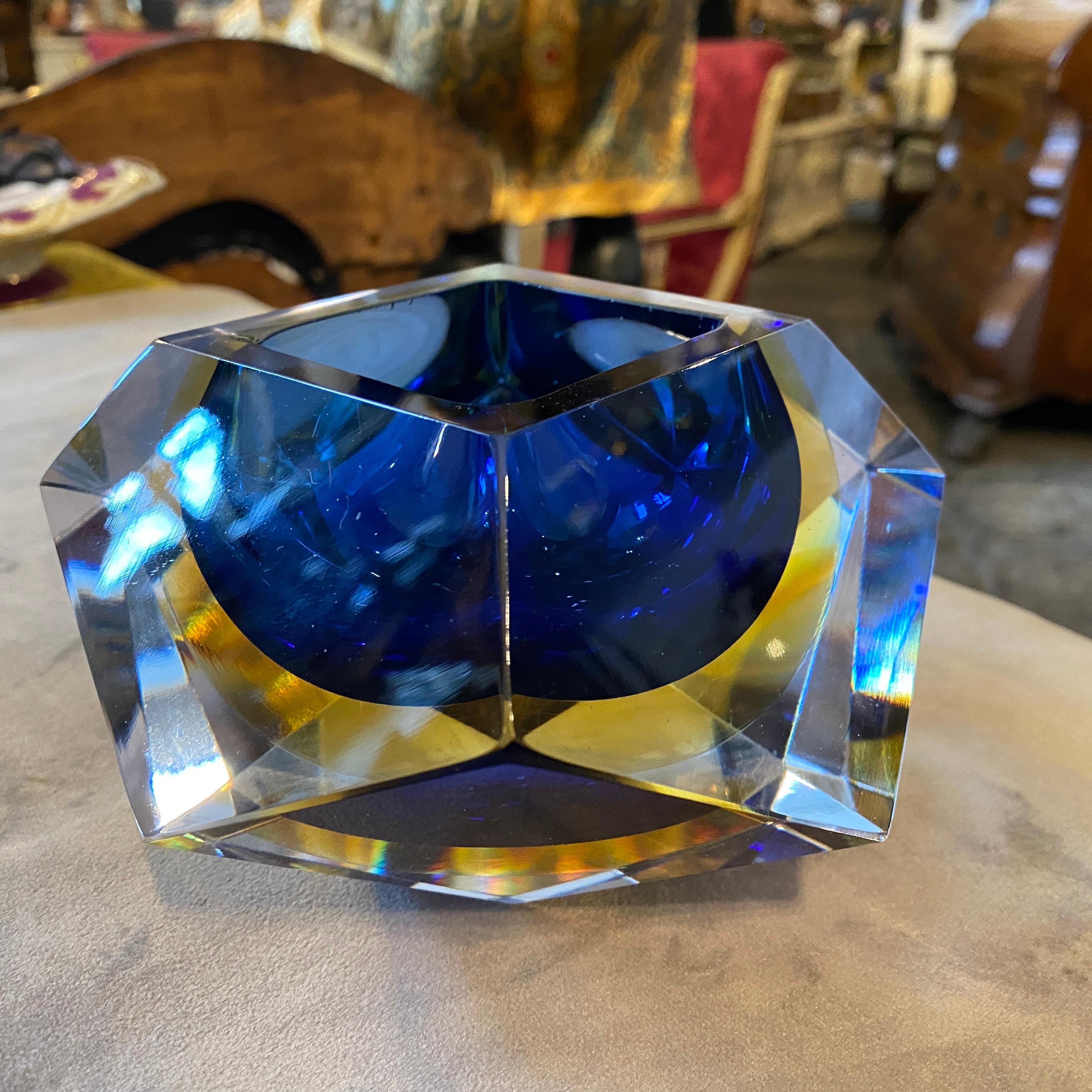 An iconic ashtray made in Italy in the seventies. The sommerso Murano glass it's in perfect condition.