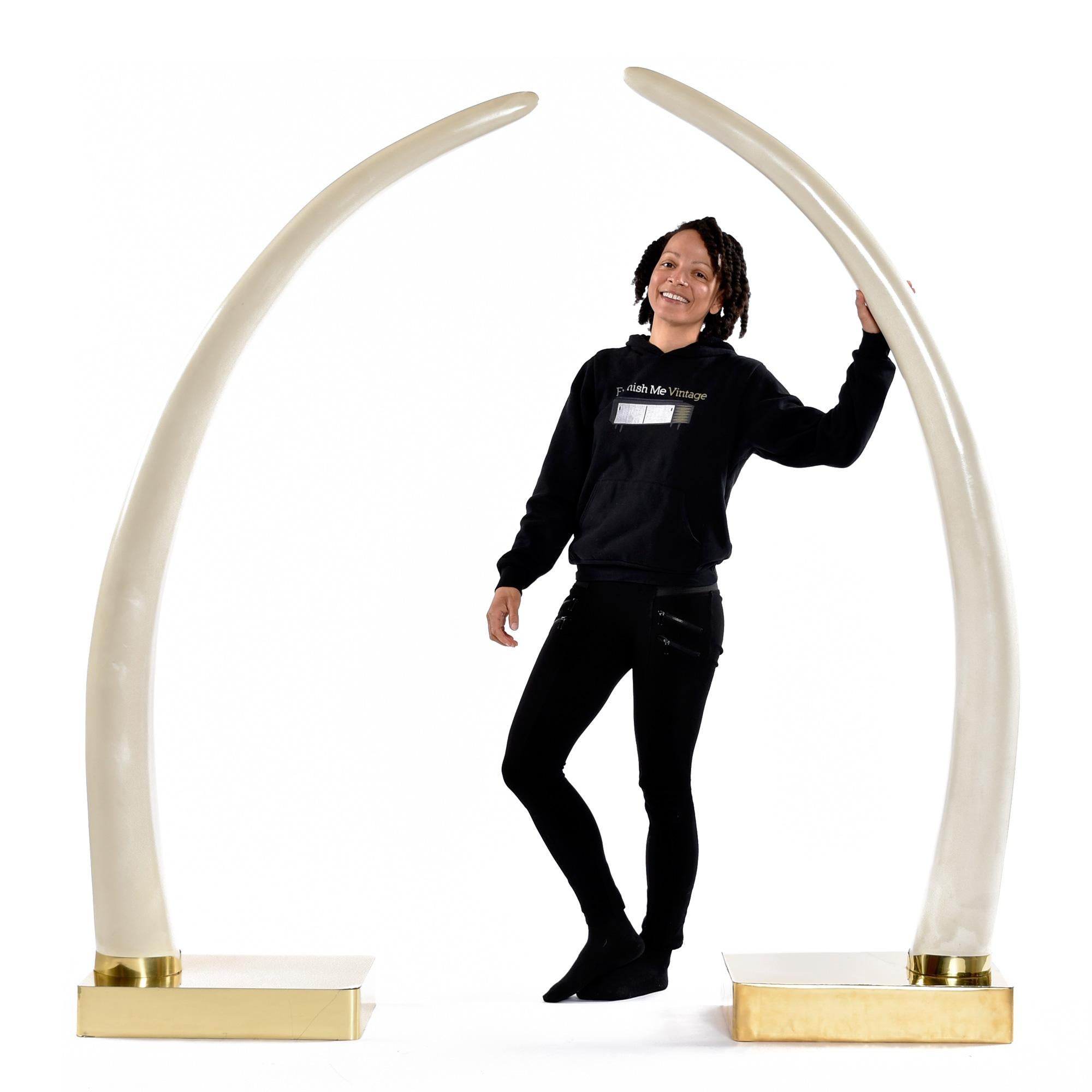 Late 20th Century Life Size 1970's Faux Ivory Elephant Tusks Mounted on Brass Bases For Sale
