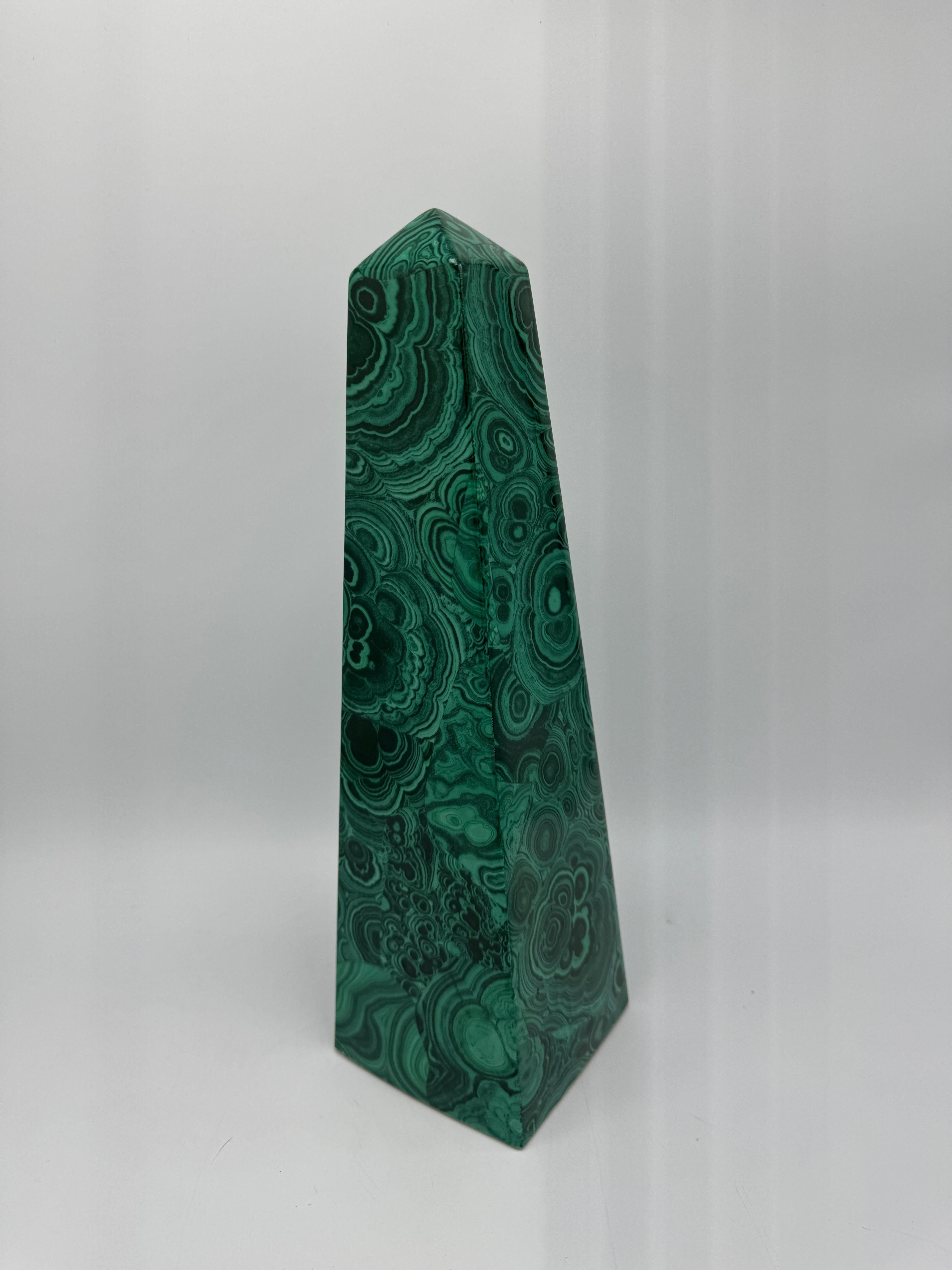 Offered is a fabulous, 1970s porcelain obelisk with a faux malachite design all over, attributed to Neiman Marcus' malachite design porcelain collection. Tall, standing just over 14in. Felt pads on underside. Hollow, but heavy - weighing 2.1lbs. Due