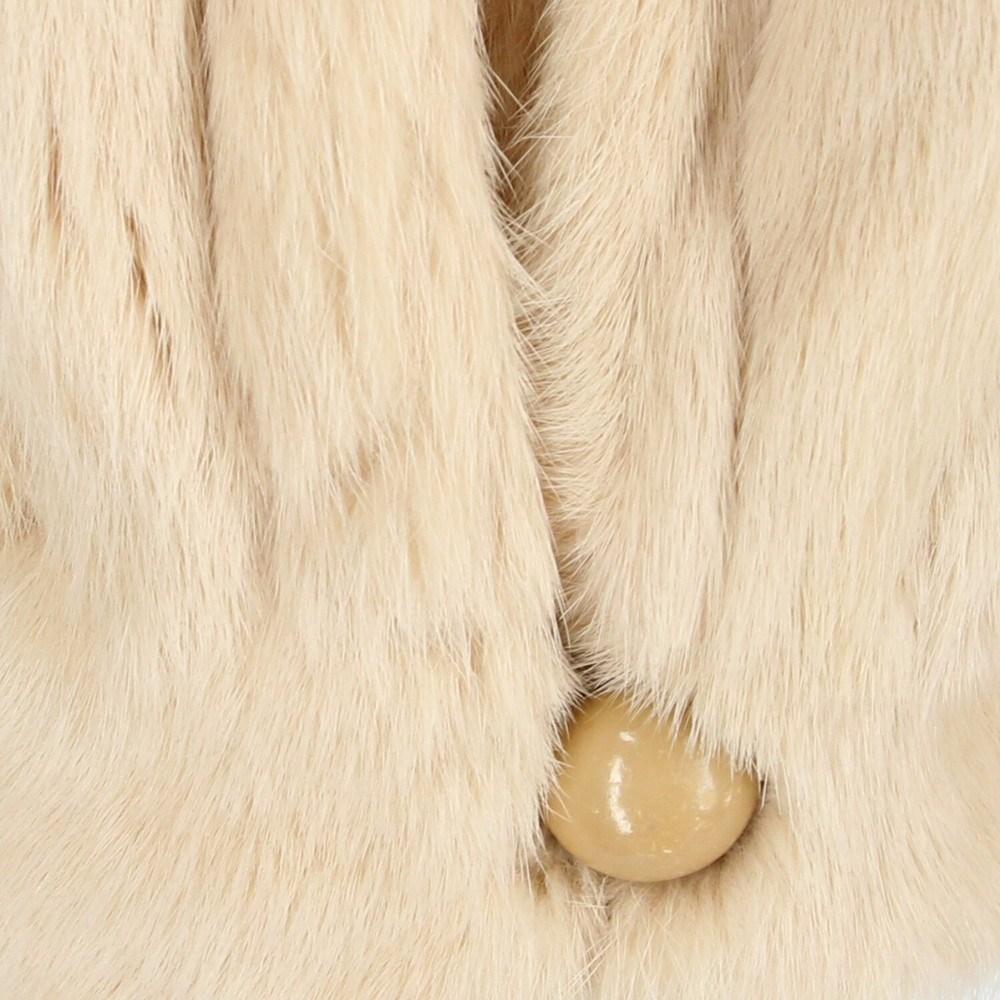 white ermine fur coat