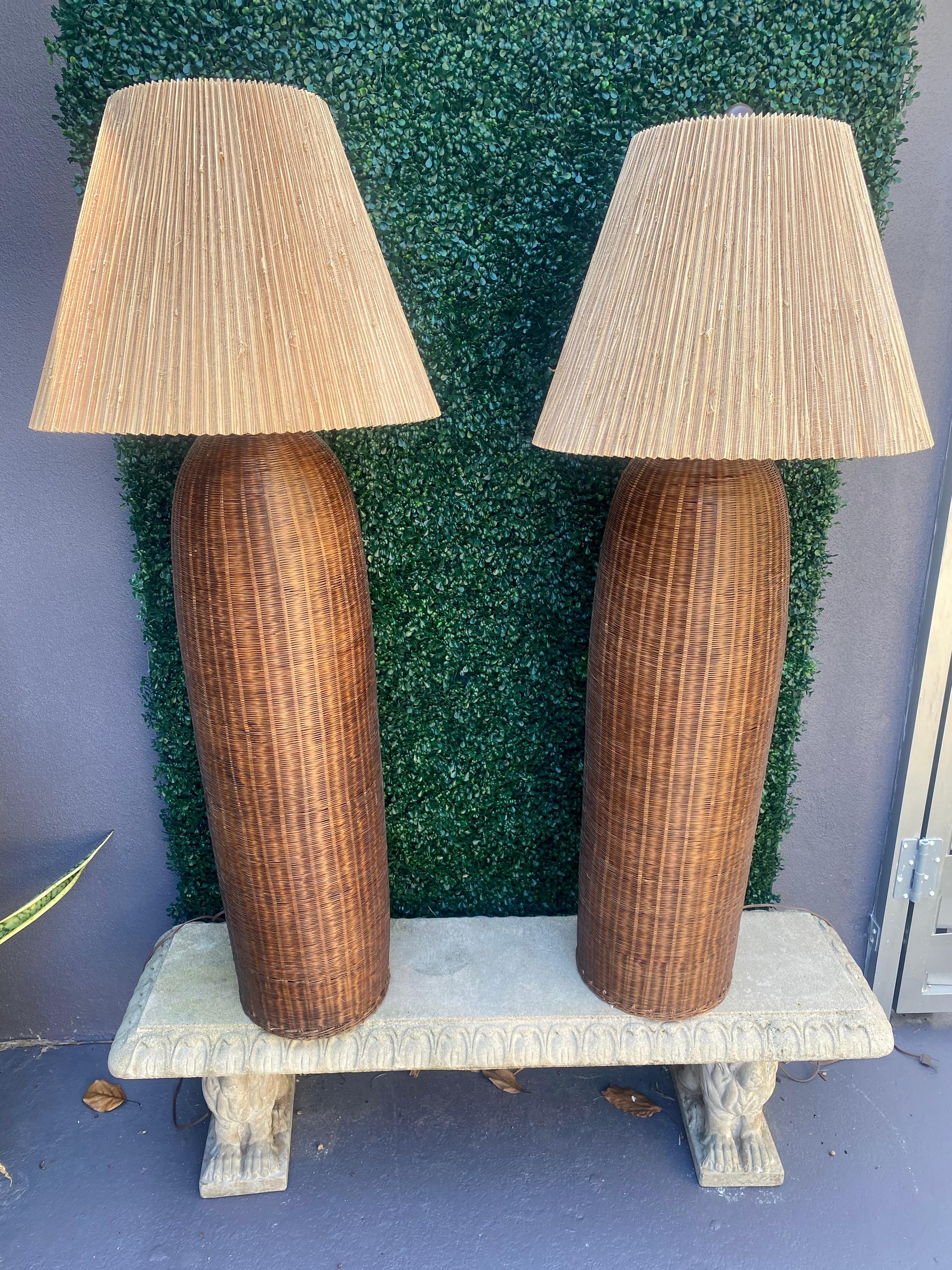 On offer on this occasion is one of the most stunning and rare, Organic thin wicker weave, rattan floor lamps you could hope to find. Structurally sound and very strong lamps. Outstanding design is exhibited throughout. The beautiful lamps are a