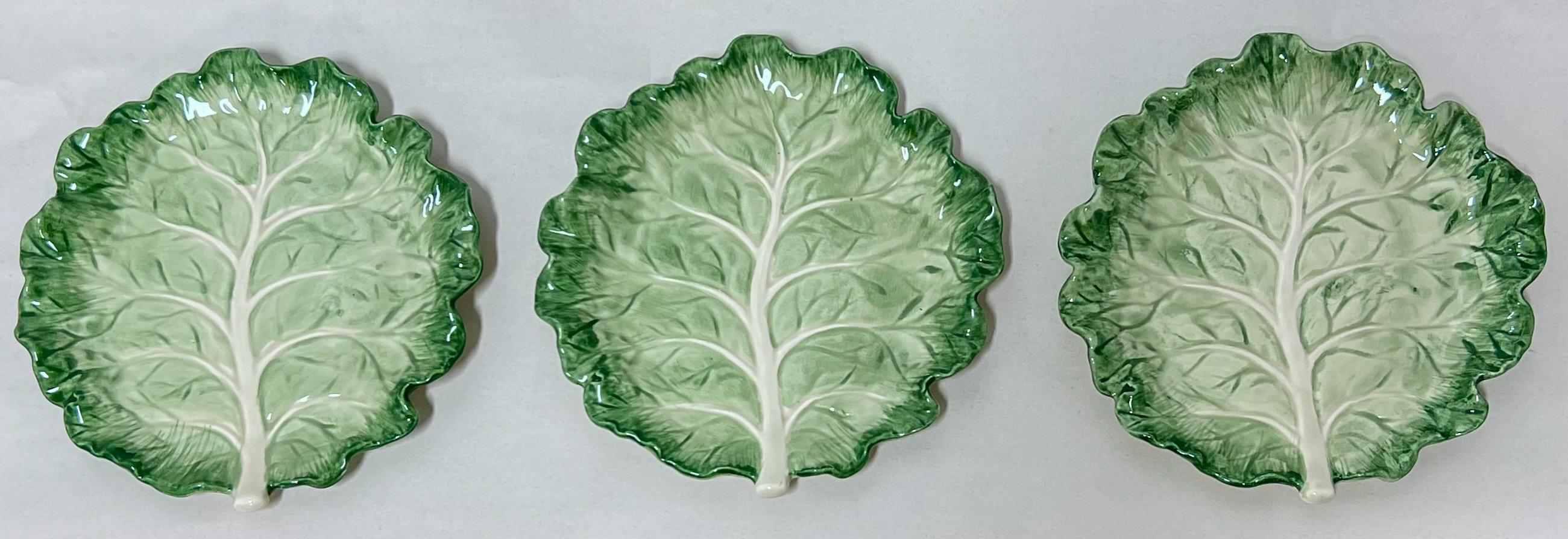 This is just in time for holiday decorating and tablescapes. It is a set of twelve ironstone lettuce or cabbage plates by Fitz& Floyd. They are marked and in very good condition.