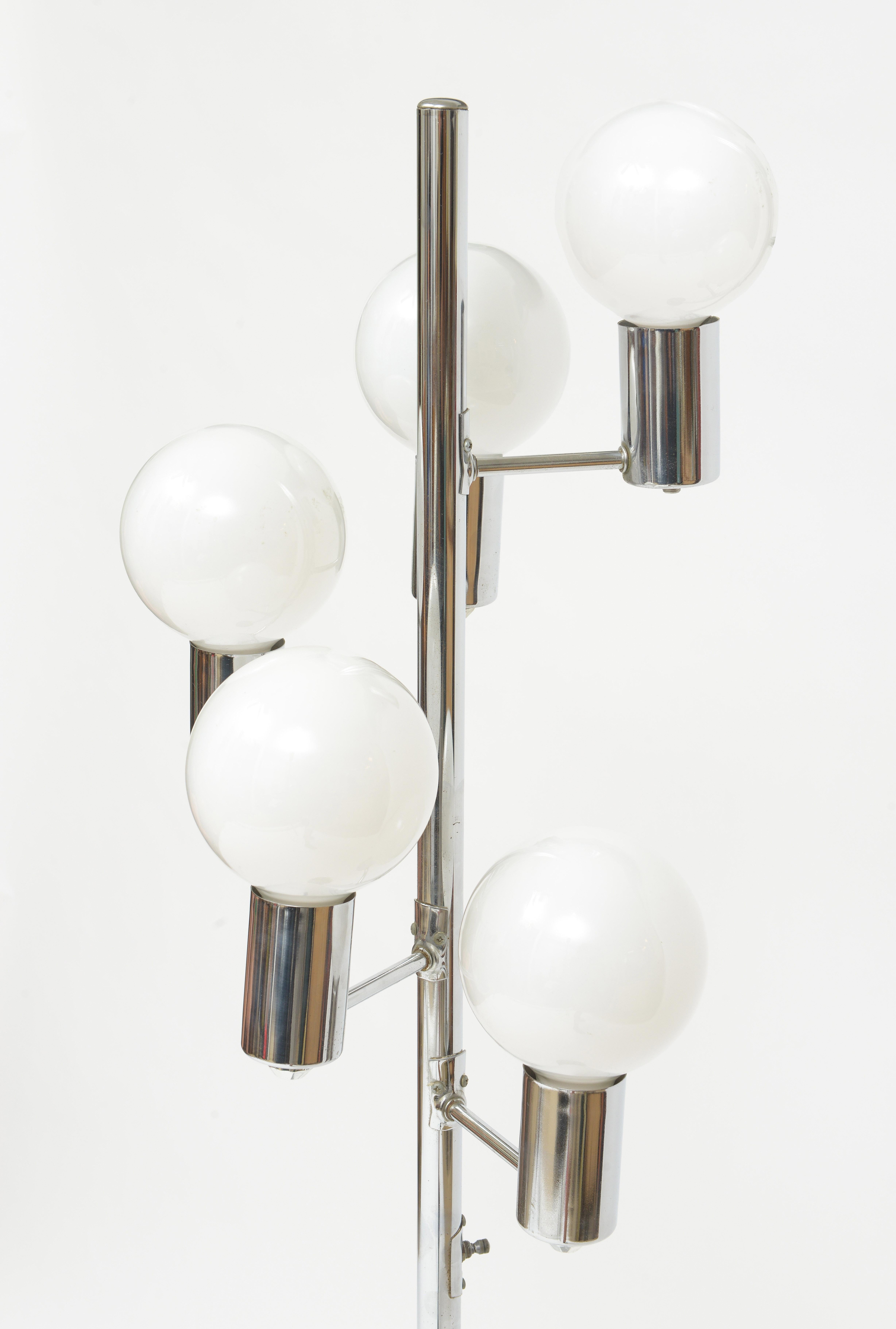 Chrome floor lamp with five white glass bulbs. Made in the 1970s (American)