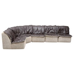 Divano modulare anni '70 a cinque pezzi in pile + pelle con cuscini reversibili