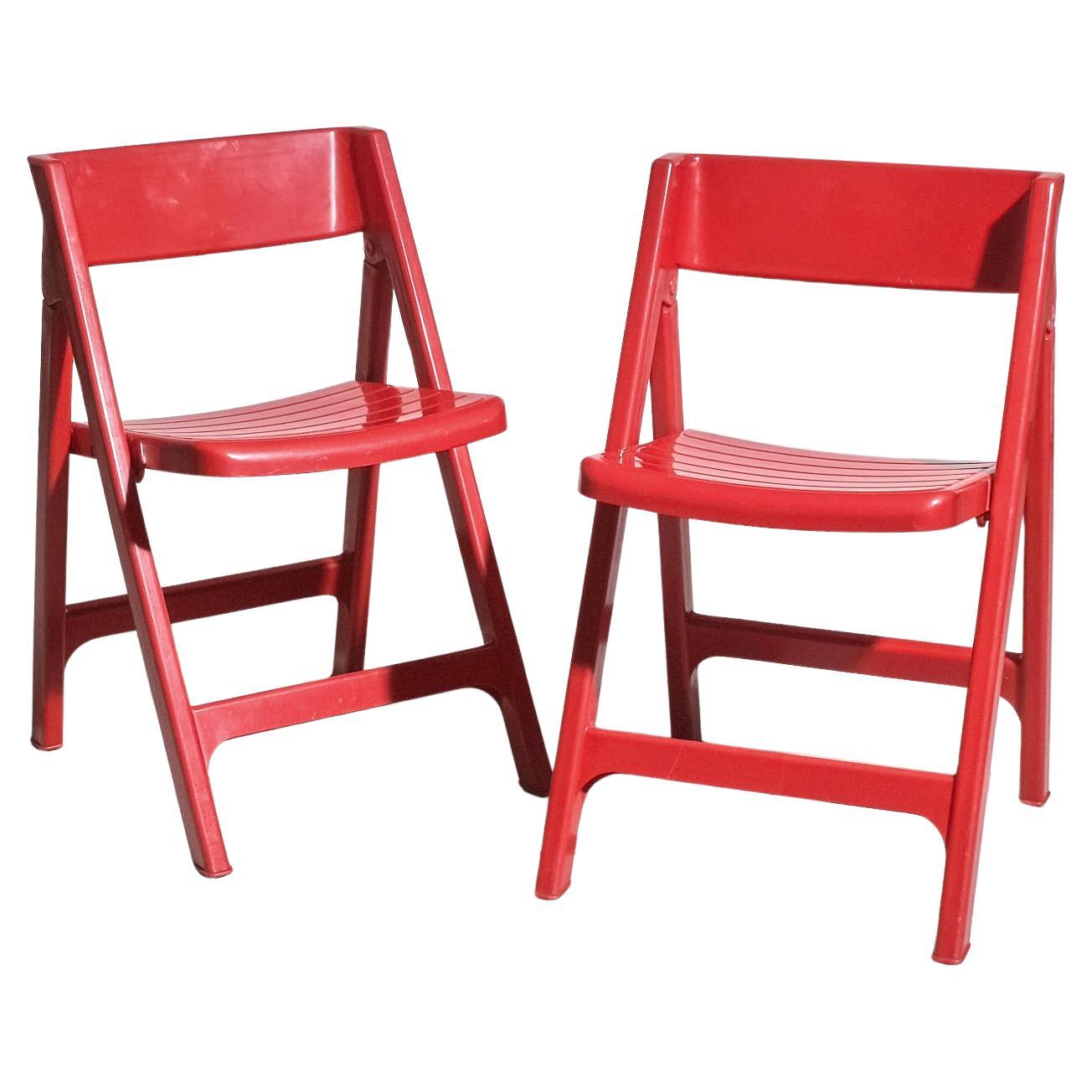 Pareja de sillas plegables "Pizzicato" rojas estilo años 70 en venta