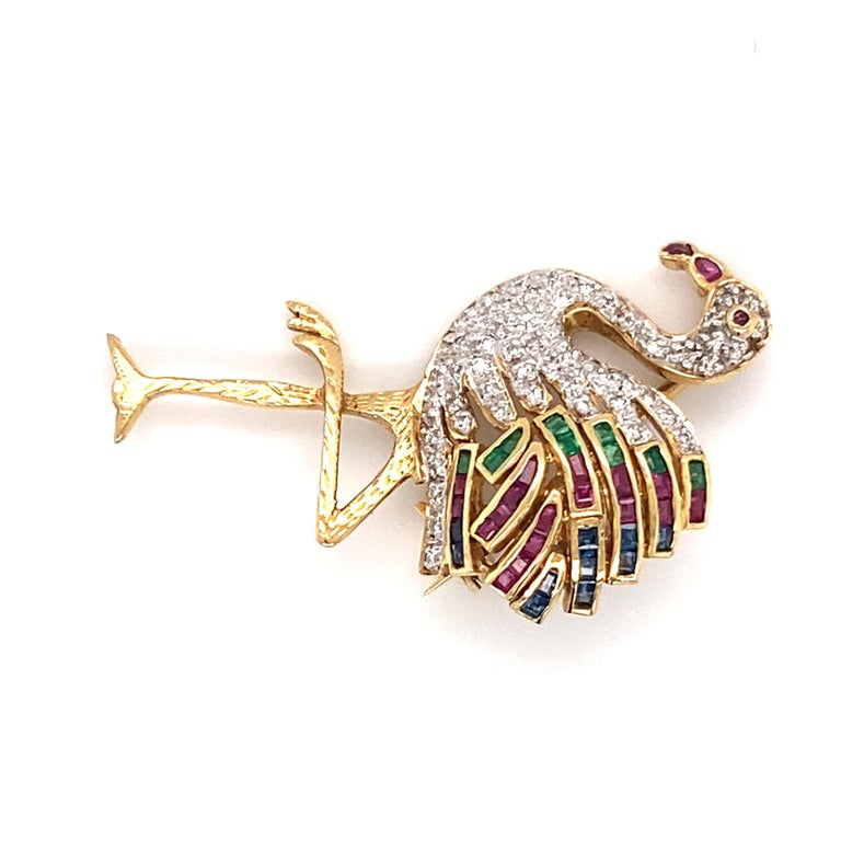 1970s Flamingo Pin featuring Ruby, Sapphire, Emerald in 18 Karat Yellow Gold In Excellent Condition For Sale In Hicksville, NY