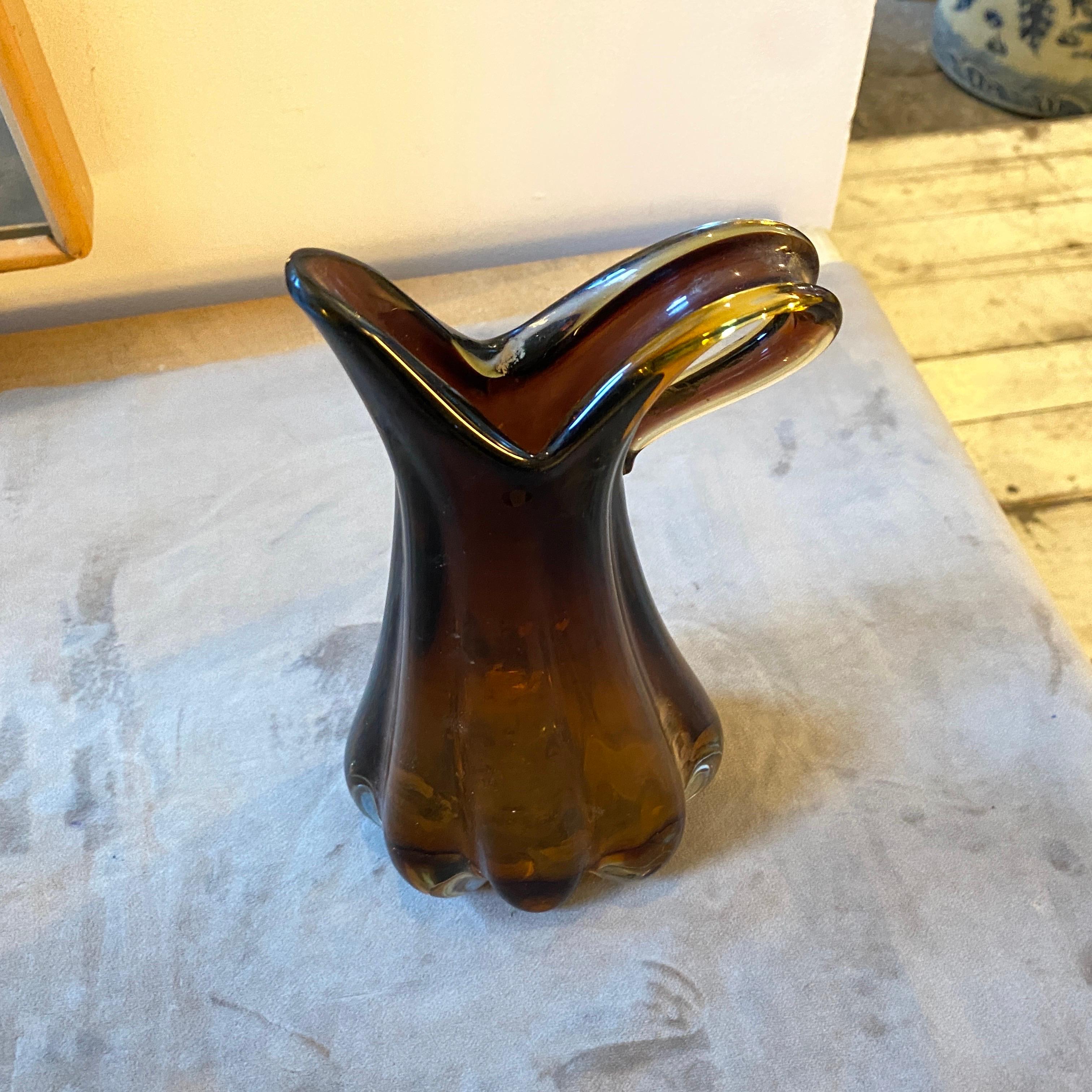 A stylish shaped brown murano glass vase made in the Seventies. It's in perfect condition.