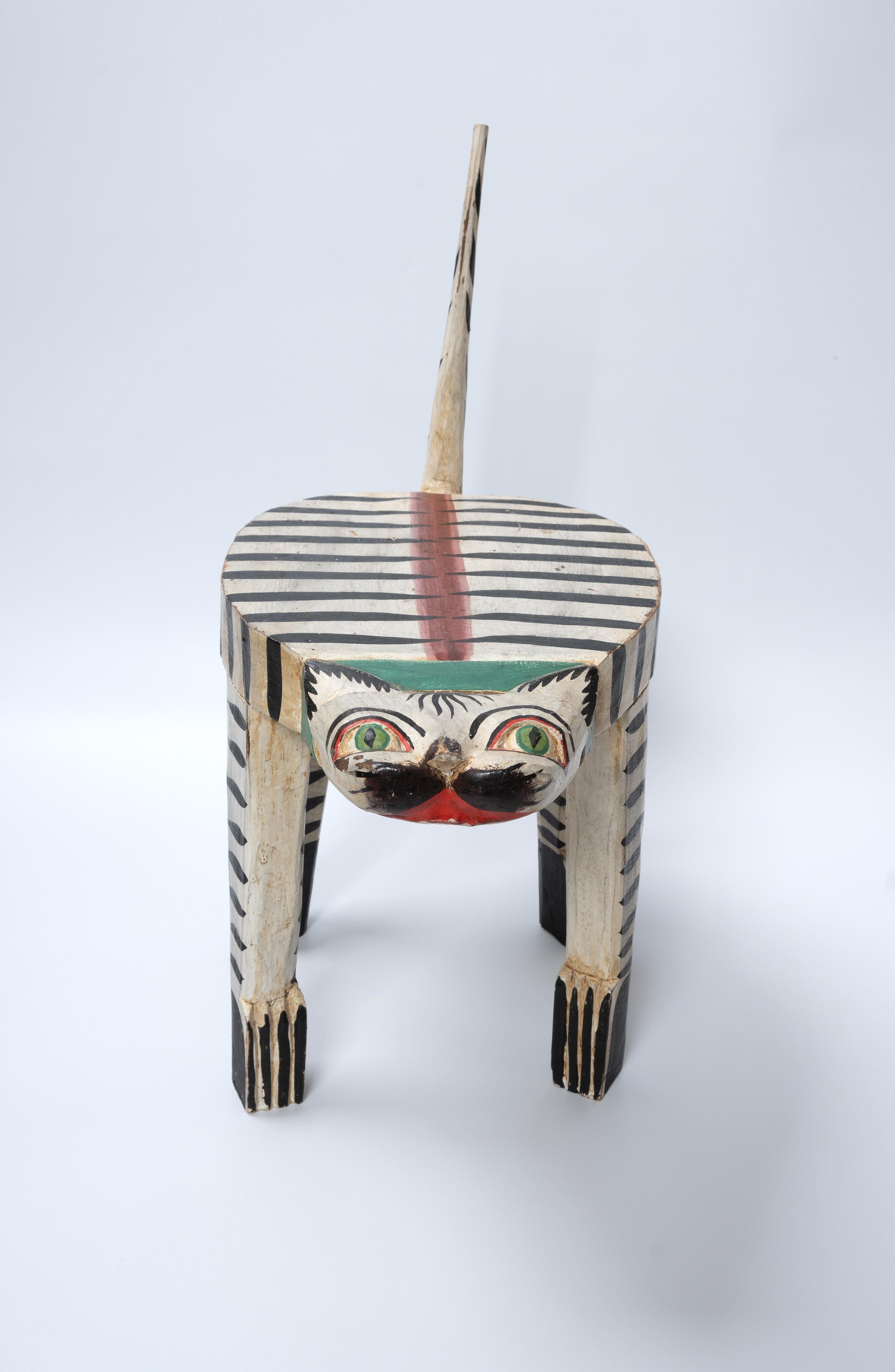 1970's Folk Art Wooden Cat Stool Side Table


Painted wooden stool/table modelled as a cat.
An interesting quirky addition offering serval functions.
Wear commensurate of age.

Dimensions:
h29.5cm / 52cm (tail)
w24cm
l44cm
