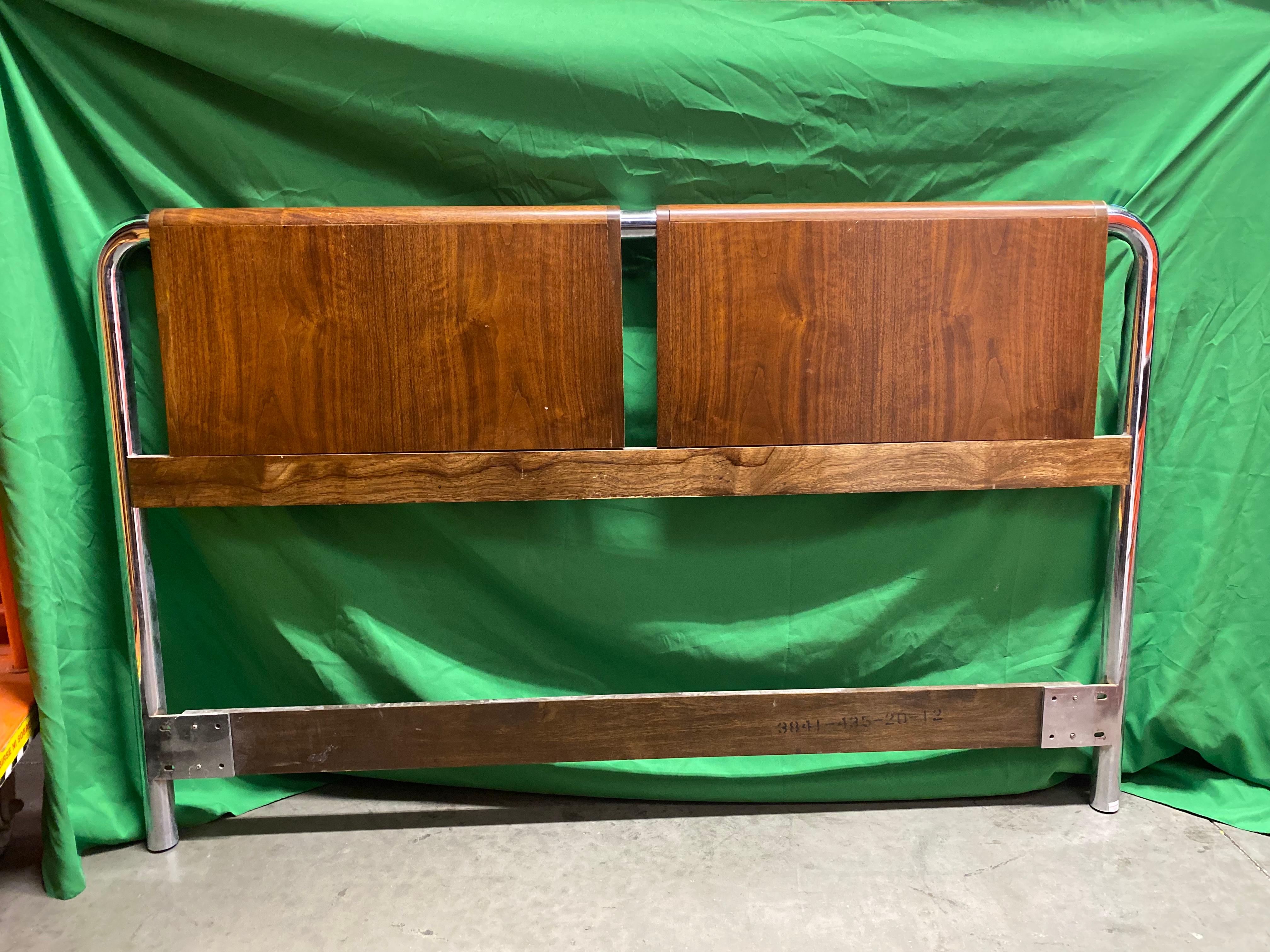 Mid-Century Modern wood and chrome bed headboard by Thomasville Furniture, Founders Collection. Rounded corners on the chrome rail with two beautiful wood panels.

Matching nightstands and high boy wardrobe available separately.