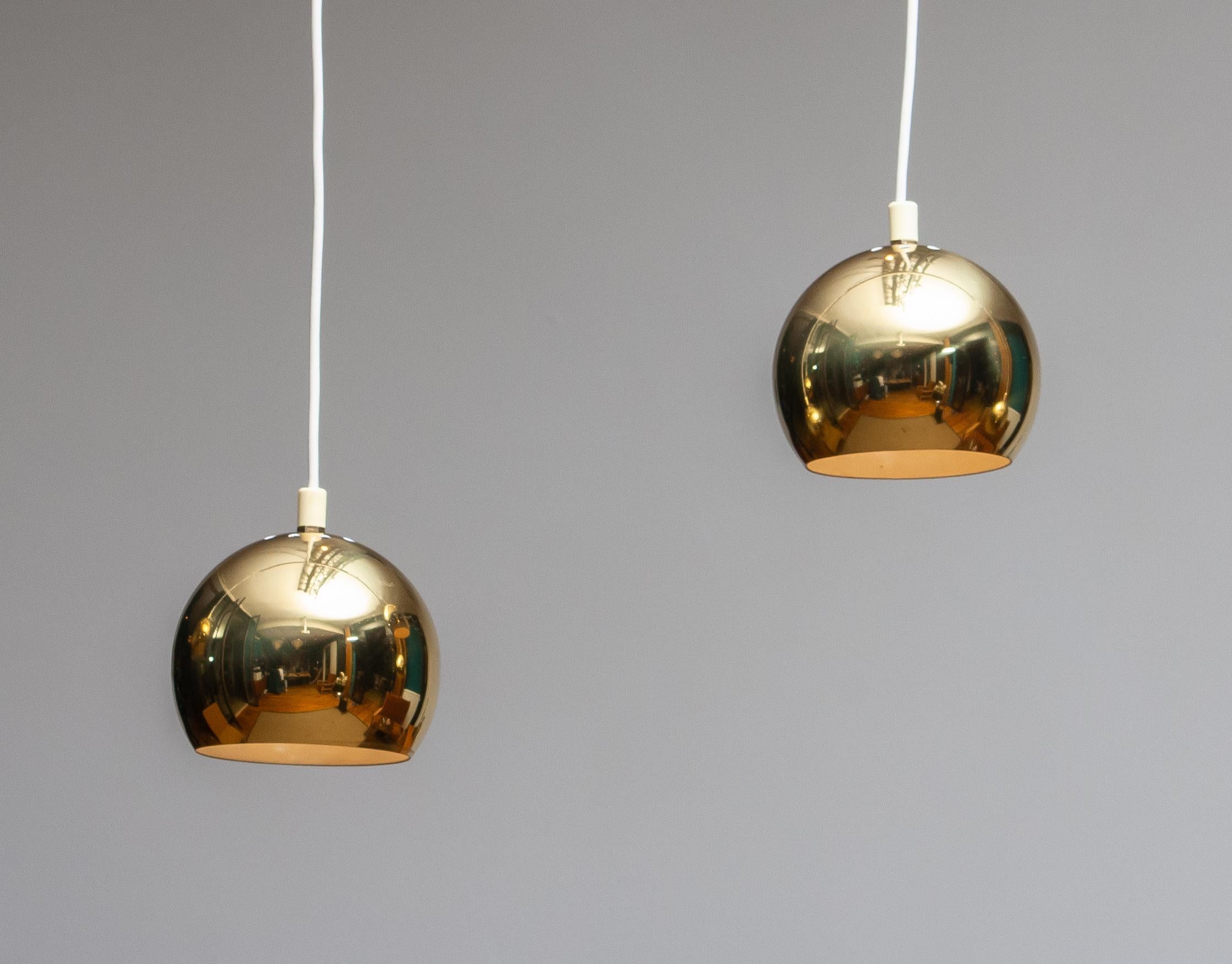Scandinavian Modern 1970s, Four Brass Spherical or Globe Shape Swedish Pendants