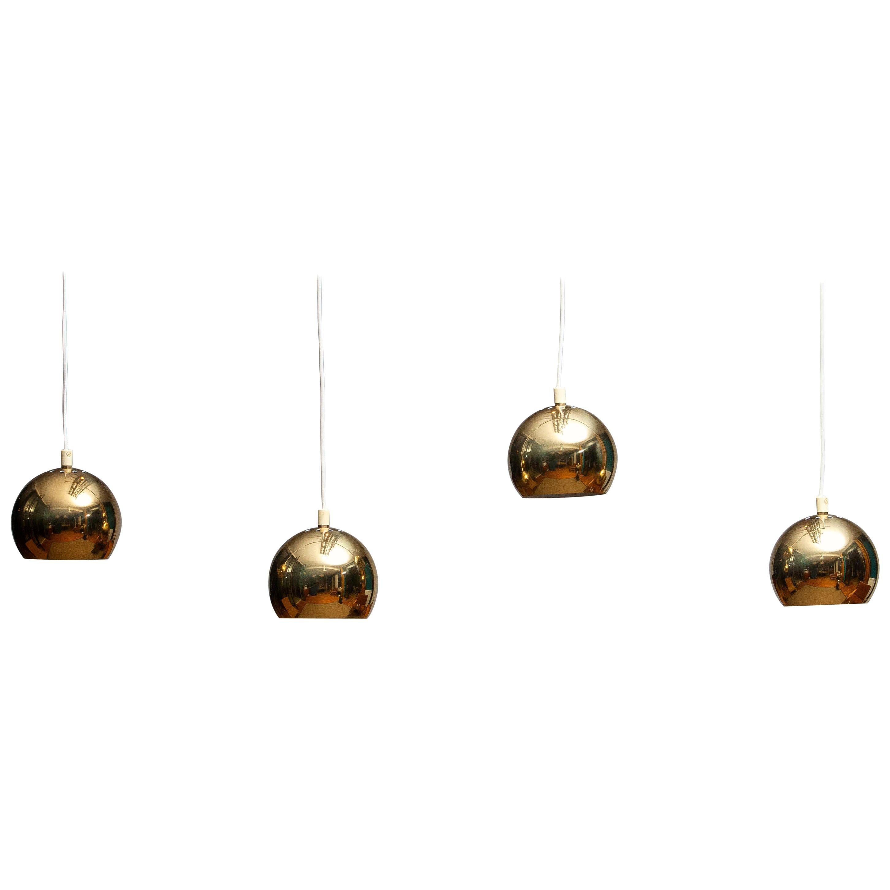 1970s, Four Brass Spherical / Globe Shape Swedish Pendants