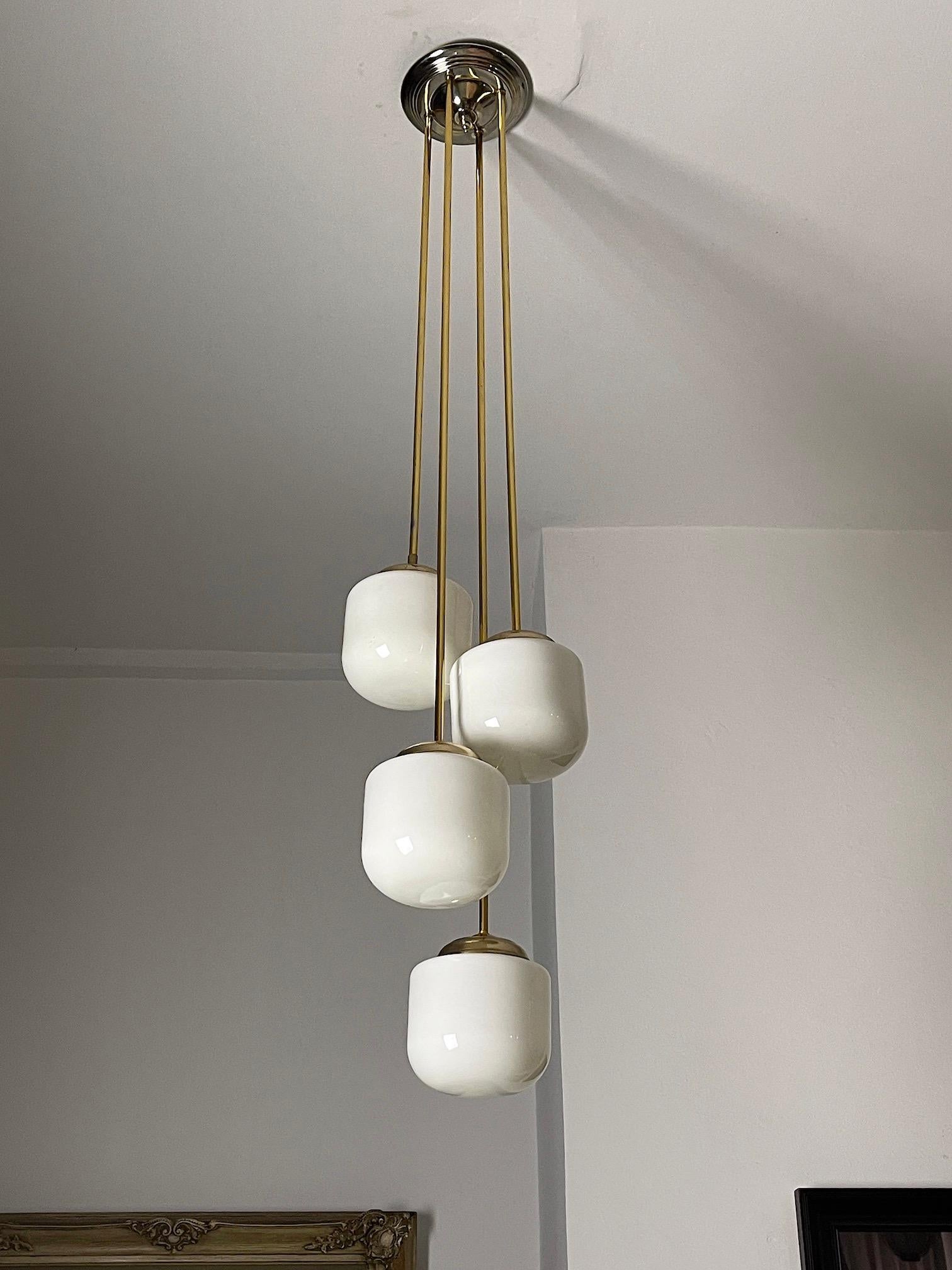 Mid-Century Modern 1970's Four Light Italian Pendant For Sale