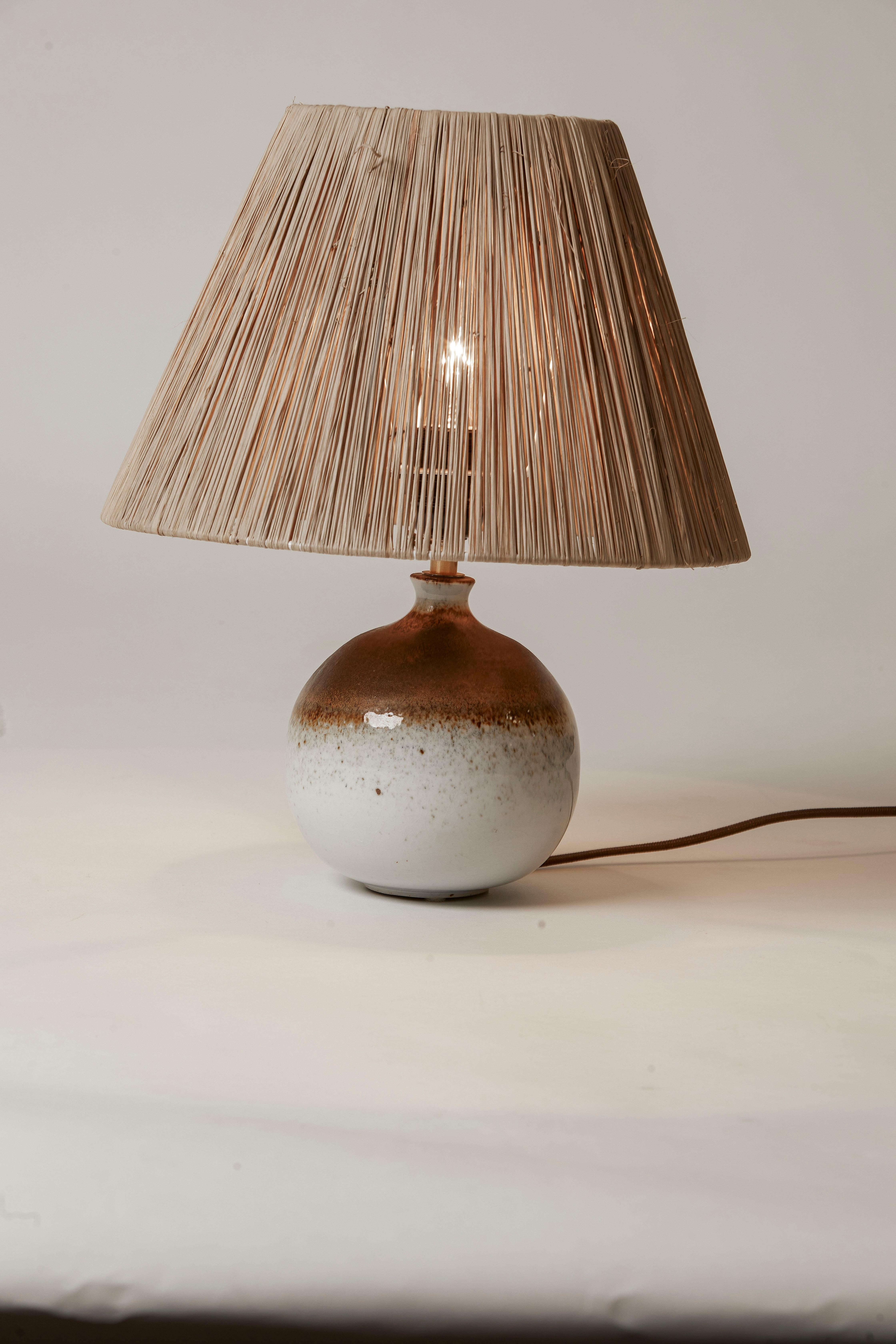 1970's France White & Caramel Petite Pottery Lamp & Raffia Shade In Good Condition For Sale In Aspen, CO