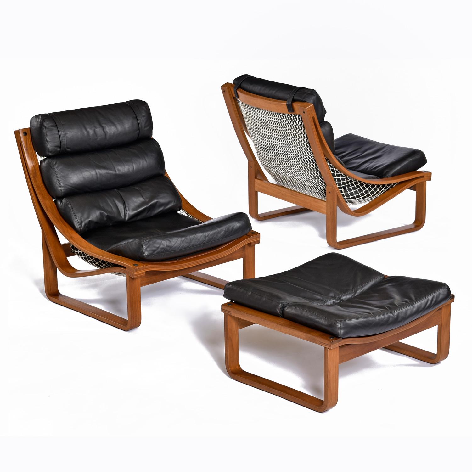 Low profile meets high comfort without compromise with this T4 Lounge Chair & Ottoman Set. This particular T4 set is an early 70s release, and is designed by Fred Lowen for Tessa Furniture. Curved, bent-ply teak rails are the ideal frame to suspend