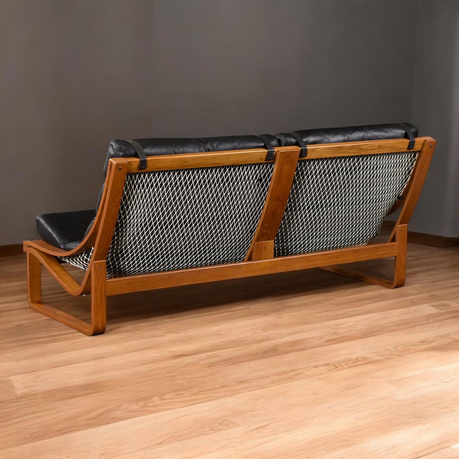 Scandinave moderne 1970 Fred Lowen pour Tessa Canapé T4 en cuir noir et teck en vente