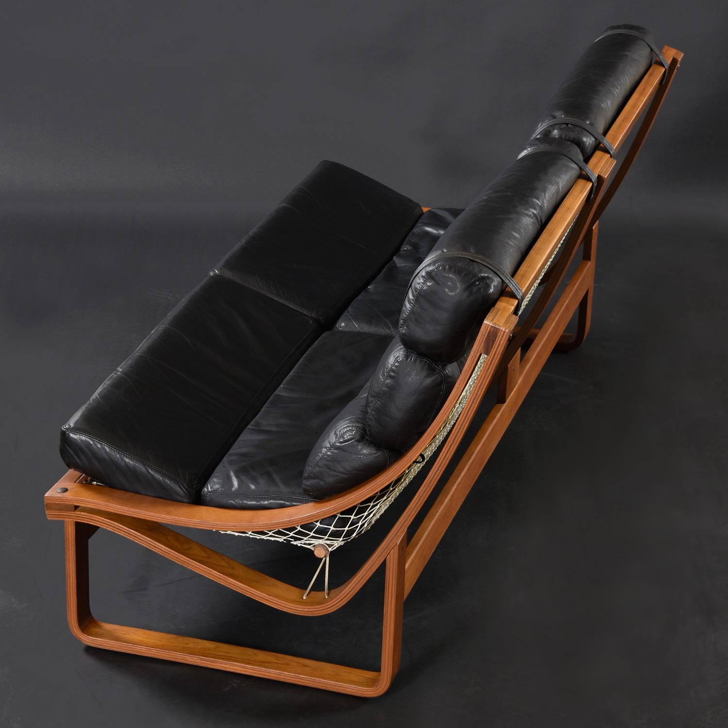 Australian 1970s Fred Lowen for Tessa Black Leather & Teak T4 Sofa For Sale
