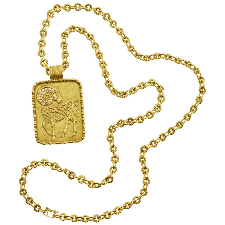 Fred Paris diamond and gold Aries zodiac pendant on a gold chain, 1970s, offered by Mahnaz Collection