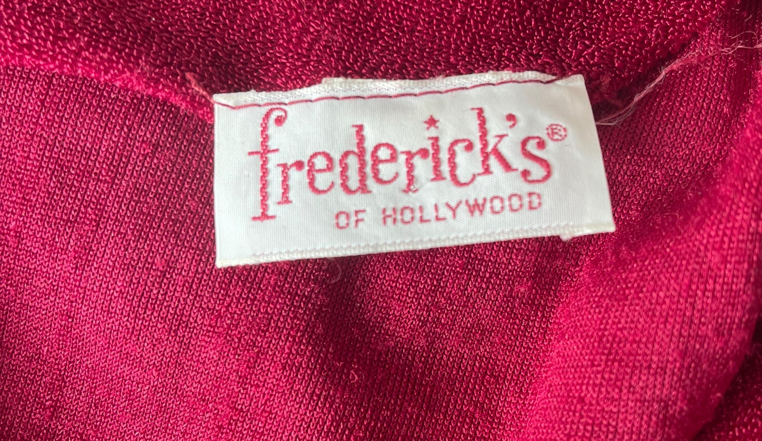 Amazing 1970s FREDERICK’S OF HOLLYWOOD burgundy / maroon velour terry cloth belted jumpsuit ! Features the softest velour fabric that stretches to fit. Tailored ruched bodice with bishop sleeves. Detachable sash belt. Slim legs with flared legs.